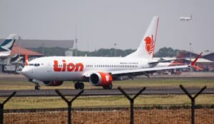 Boeing has reached a tentative $1.1 billion agreement with the U.S. Department of Justice to settle criminal charges related to the 737 MAX crashes of 2018 and 2019, which killed 346 people. The deal includes financial penalties, a victims' fund, and enhanced oversight measures. Boeing avoids trial but admits to misleading the FAA, drawing criticism from victims' families and sparking debate on corporate accountability