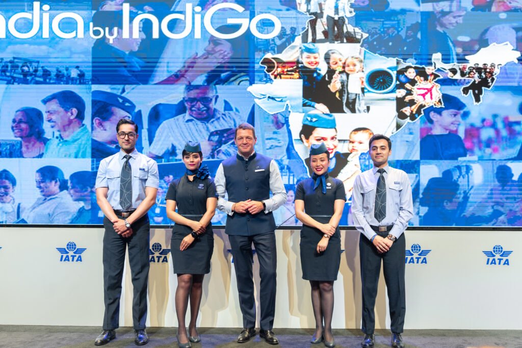 New Delhi, India: The International Air Transport Association (IATA) concluded its 81st Annual General Meeting (AGM) in New Delhi, bringing together more than 300 airline CEOs, regulators, and aviation stakeholders from across the globe. Hosted by IndiGo, the event marked India's first time hosting the AGM in over four decades and focused on rebuilding resilience in the aviation industry through growth, sustainability, and strategic collaboration.
The agenda covered financial projections, climate targets, airspace challenges, and infrastructure investments, but the meeting also served as a global stage for key announcements from leading airlines shaping the post-pandemic recovery.
Industry Financial Outlook and Challenges
IATA adjusted its 2025 profit outlook slightly downward, projecting a global net profit of $36.0 billion, down from the $36.6 billion estimate released earlier this year. This revision, according to IATA, reflects macroeconomic uncertainty, prolonged aircraft delivery delays, and airspace restrictions in several regions.
Despite the dip, the global aviation industry remains on a path to recovery, with projected total revenues nearing $979 billion and passenger traffic expected to approach 5 billion in 2025. However, cargo revenues have cooled, stabilizing at levels below pandemic highs.
Carbon Commitments and SAF Bottlenecks
Sustainability remained central to this year’s AGM, with global carriers reaffirming their commitment to achieving net-zero carbon emissions by 2050. IATA noted that the goal requires cumulative investment of nearly $4.7 trillion, a major portion of which depends on ramping up Sustainable Aviation Fuel (SAF) production.
Currently, SAF accounts for less than 1% of total aviation fuel use. Airline executives urged governments to create policy frameworks and incentives for SAF manufacturing, pointing out that current supply levels are far from sufficient to support decarbonization targets.
Safety Amid Geopolitical Disruptions
Several airline heads, including those from Middle Eastern and European carriers, raised concerns over growing airspace instability due to geopolitical tensions. Conflicts in Eastern Europe and the Middle East have forced longer detours, increasing fuel burn and operational costs.
IATA is working with global regulators to enhance coordination between civil aviation bodies and defense authorities, aiming to reduce rerouting delays and improve forecasting of regional airspace risks.
Key Airline Developments Announced During the AGM
Several airlines made significant announcements at the AGM that align with broader industry goals of network expansion, sustainability, and digital integration:
IndiGo, India’s largest airline by market share, announced that it is doubling its widebody order of Airbus A350s, adding 30 more aircraft to its existing order of 30. This move signals a clear shift toward international long-haul operations, with deliveries expected to begin in 2027.
Virgin Australia revealed plans to return to the Australian Securities Exchange (ASX) through a $2.3 billion IPO, offering more than 236 million shares at $2.90 each. The listing reflects the airline’s renewed financial health following its 2020 administration and a tighter focus on domestic operations and profitability.
Air India and Air Mauritius jointly announced the expansion of their existing codeshare agreement, improving connectivity between India and Africa. Effective July 1, 2025, the agreement is expected to enhance route integration, streamline passenger transfers, and expand seat availability on shared routes.
Riyadh Air, the emerging Saudi national carrier expected to launch commercial operations in 2025, signed multiple MoUs with global airlines including Singapore Airlines, Delta Air Lines, and China Eastern. These partnerships aim to facilitate future codeshare routes and lay the groundwork for integrated digital platforms.
Aegean Airlines confirmed that it will commence direct flights between Athens and India using its new Airbus A321LR aircraft, with services expected to start by 2027. The move marks the Greek carrier’s first foray into the Indian market, aiming to tap into growing travel and tourism demand between Southern Europe and South Asia.
India’s Aviation Growth Trajectory
During the inaugural session, Prime Minister Narendra Modi addressed delegates via video message, presenting India’s vision to become a global aviation hub by 2047, coinciding with the country's 100th year of independence. The government aims to increase the number of operational airports from 157 to 400, while tripling passenger capacity over the next two decades.
India’s aviation sector, already one of the fastest-growing globally, is witnessing rapid infrastructure expansion. However, challenges such as pilot shortages, aircraft supply constraints, and simulator training capacity remain pressing issues. Several airlines are already in talks with global training providers to bridge the gap.
IATA Leadership and AGM 2026 Host
Luis Gallego, CEO of International Airlines Group (IAG), was appointed as the Chair of the IATA Board of Governors, succeeding Marjan Rintel of KLM. Gallego will lead the board through the next term, focusing on accelerating climate transitions, digital transformation, and cross-border operational standardization.
It was also confirmed that the 82nd IATA AGM will be held in Rio de Janeiro, Brazil, in June 2026, hosted by LATAM Airlines Group.
About IATA:
The International Air Transport Association represents more than 320 airlines, accounting for over 80% of global air traffic. The AGM serves as the association’s highest decision-making body, enabling members to discuss policy, industry challenges, and future direction.
