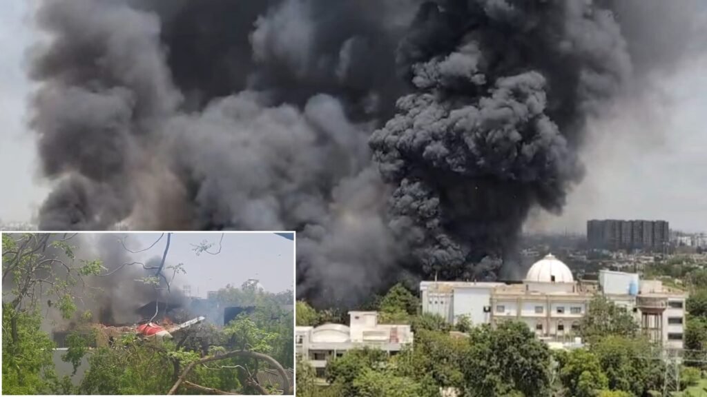 Ahmedabad, Gujarat: An Air India passenger aircraft crashed earlier today near Sardar Vallabhbhai Patel International Airport in Ahmedabad. The aircraft reportedly had over 200 people on board when the incident occurred. While the cause of the crash remains unknown, the incident took place either during landing or shortly after takeoff, according to early eyewitness accounts. Thick black smoke was seen rising from the crash site in the Ghoda Camp area of Meghani Nagar, not far from the airport perimeter. Emergency teams, including fire brigade units and medical responders, were immediately deployed to the scene. Police quickly sealed off the surrounding roads to allow unhindered access for rescue operations. Firefighters worked to control the blaze and secure the wreckage while medical staff prepared to transport any injured individuals. At the time of reporting, there has been no official confirmation regarding injuries or fatalities. Authorities have yet to release details about the specific flight route, aircraft model, or flight number involved. The Directorate General of Civil Aviation (DGCA) and Air India are expected to conduct a joint investigation into the circumstances surrounding the crash. Local residents reported hearing a loud noise before seeing smoke rising from the area. Videos circulating online show flames and a plume of smoke coming from the crash site, with rescue workers moving swiftly through debris and damaged surroundings. This is a developing story, and further details are expected as officials complete their initial assessment of the crash. Authorities have urged the public to avoid the area and refrain from sharing unverified information online.