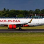 Mumbai, India: A routine Air India flight from London to Mumbai reported a medical incident onboard on Monday, prompting an investigation by airline officials and aviation authorities. Several passengers and crew members reportedly experienced symptoms of dizziness and nausea during the flight. The cause of the incident is currently under review. Incident Details Air India flight AI-130, operated by a Boeing 777 aircraft, departed from London Heathrow on schedule and was en route to Chhatrapati Shivaji Maharaj International Airport, Mumbai. While cruising at approximately 35,000 feet, five passengers and two cabin crew members reported feeling unwell. Initial symptoms included lightheadedness, nausea, and dizziness. Upon landing in Mumbai, medical teams met the aircraft at the gate. Two passengers and two crew members were immediately taken for medical screening. All four individuals were treated and discharged the same day. According to Air India’s official statement, no emergency was declared during the flight, and the aircraft landed without incident. The pilots were not affected and completed the flight normally. The airline confirmed that standard operating procedures for inflight medical support were followed. Investigation and Safety Checks Preliminary findings have ruled out cabin depressurization, as oxygen masks were not deployed and no pressure loss was recorded. The Directorate General of Civil Aviation (DGCA) has been notified of the incident and is assisting in the inquiry. One of the leading theories under review is the possibility of food contamination. Air India has confirmed that the affected individuals had consumed meals served during the flight. Samples of onboard catering have been collected and sent for analysis. In accordance with aviation protocols, cockpit crew members are served meals different from those offered to passengers and cabin crew. Both pilots reportedly consumed their meals without incident, which may have prevented a more critical situation in the cockpit. The DGCA is expected to conduct a thorough review of the airline’s inflight service procedures, food sourcing and handling protocols, and cabin health and safety systems. This follows closely after recent safety audits initiated by the regulator in response to a series of operational and technical disruptions faced by the carrier over the past month. As part of the ongoing safety initiative, random inspections of Air India’s Boeing 777 and 787 aircraft are also being carried out, though no technical anomalies have been linked to this incident. Passenger Advisory While Air India has not issued a formal passenger advisory, travelers are encouraged to report any post-flight illness to the airline or medical authorities. Passengers onboard AI-130 are being contacted by the airline as a precautionary follow-up. The exact cause of the in-flight illness aboard AI-130 remains undetermined pending laboratory results and further investigation. Air India has assured full cooperation with regulatory authorities and reiterated its commitment to maintaining the highest standards of passenger safety and wellbeing.