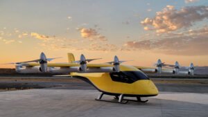 In a significant move to support the safe introduction and global scalability of Advanced Air Mobility (AAM) aircraft, five leading aviation authorities have released a unified roadmap outlining a common approach to the type certification of powered-lift and eVTOL (electric Vertical Takeoff and Landing) aircraft. The roadmap is the product of a collaborative effort between the Civil Aviation Safety Authority (Australia), Transport Canada Civil Aviation (Canada), Civil Aviation Authority (New Zealand), Civil Aviation Authority (United Kingdom), and the Federal Aviation Administration (United States), together forming the National Aviation Authorities (NAA) Network. A Framework for Certifying Next-Generation Aircraft The roadmap establishes a strategic, phased approach to streamline certification standards across jurisdictions, reduce regulatory divergence, and support mutual recognition of type certificates. Central to the document is a commitment to aligning on six key principles: Balancing Safety and Innovation – Ensuring emerging technologies meet robust safety standards while enabling innovation in aircraft design, propulsion, and autonomy. Harmonized Type Certification – Implementing a three-step certification model using performance-based requirements, convergence of differing standards, and adoption of mutually accepted means of compliance. Collaboration and Alignment – Promoting cooperation among network members and parallel alignment with other authorities actively working on AAM certification projects. Collaborative Multi-Authority Validation – Leveraging opportunities to validate a single aircraft design across multiple authorities simultaneously, reducing redundant certification effort. Incremental Certification Pathway – Adopting a “crawl, walk, run” approach to certification, starting with piloted aircraft and expanding to remotely piloted and autonomous systems. AAM-Inclusive Bilateral Agreements – Updating existing international agreements to incorporate streamlined validation and certification provisions for AAM aircraft. Performance-Based Standards and Consensus Methods The roadmap encourages the use of performance-based certification standards, as opposed to prescriptive rules, to better accommodate the novel design features of eVTOL and other AAM aircraft. Where discrepancies exist such as between FAA’s airworthiness criteria (AC 21.17-4) and the UK CAA’s SC-VTOL—the roadmap outlines strategies for convergence and mutual acceptance. The framework also endorses the use of industry-developed consensus standards as acceptable means of compliance, especially in areas where harmonization of requirements may not be fully achieved. Streamlined Validation and Shared Compliance To facilitate cross-border validation of certified aircraft, the roadmap proposes a streamlined validation model. This model prioritizes attention on technical differences between jurisdictions while allowing validation authorities to accept findings of compliance where no divergence exists. It also recommends the use of multi-validation teams and shared compliance information to further minimize time and resource expenditure. A Living Document for Evolving Technology Recognizing the rapid pace of innovation in the AAM sector, the roadmap is designed as a living document, to be updated as more certification projects progress and as new technologies such as hydrogen propulsion and autonomous flight become more prevalent. It provides a basis for continuous improvement and international alignment through coordinated updates and collaborative knowledge exchange. Implementation of the roadmap includes the continued exchange of certification data, convergence on airworthiness standards, increased involvement in standards development organizations (SDOs), and progressive updates to bilateral agreements. The NAA Network also aims to expand collaboration by welcoming additional member authorities and strengthening ties with ICAO, EASA, and other stakeholders. This initiative marks a major milestone in preparing the global regulatory ecosystem for the safe and efficient entry of AAM into service. By uniting efforts across national boundaries, the NAA Network’s roadmap lays the foundation for a harmonized, scalable, and safety-focused future of advanced aviation.