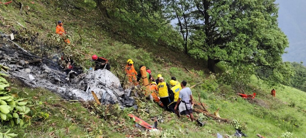 Uttarakhand, India: A Bell 407 helicopter operated by Aryan Aviation crashed in a remote forested area near Garudchatti shortly after departing from Kedarnath, killing all seven people on board. The helicopter, which took off at around 5:30 a.m., was en route to Guptkashi when it reportedly encountered dense fog and poor visibility, leading to loss of control and a fatal impact into a hillside near Trijuginarayan. The victims included five pilgrims: Captain Rajveer Singh Chauhan - Pilot Rajkumar Jaiswal, Shraddha Jaiswal and their two-year-old daughter Kashi - Uttar Pradesh Tushti Singh - Uttar Pradesh Vikram Singh Rawat - Uttarakhand Vinod Neg - Temple Committee Staff member A retired Indian Army officer, Captain Chauhan had over 2,000 hours of flying experience. The impact caused the helicopter to catch fire, leaving all seven occupants charred beyond recognition. Their remains were taken to Rudraprayag District Hospital for identification and medical procedures. Eyewitnesses in nearby villages reported hearing a loud explosion minutes after the helicopter disappeared from sight. Local police and emergency responders reached the crash site swiftly, though the difficult terrain hampered access. Authorities have launched a multi-agency investigation into the crash. The Directorate General of Civil Aviation (DGCA) and the Aircraft Accident Investigation Bureau (AAIB) are leading the inquiry. Sonprayag Police have filed a case under Section 105 of the Bharatiya Nyaya Sanhita (culpable homicide not amounting to murder) and under Section 10 of the Aircraft Act, holding Aryan Aviation and its executives accountable for operating flights despite reported poor weather conditions in the area. In immediate response, Uttarakhand Chief Minister Pushkar Singh Dhami ordered the suspension of all helicopter operations in the Char Dham circuit until further notice. The Uttarakhand Civil Aviation Development Authority (UCADA) has also been directed to audit all existing helicopter operators and enforce stricter compliance with aviation safety standards. This is not the first fatal crash in the region. The Kedarnath route has seen several aviation accidents in the past decade: On May 8, 2025, another Bell helicopter (VT-OXF) crashed into a deep gorge near Gangnani, Uttarkashi, during a Yamunotri pilgrimage flight. Six people died, and one passenger survived with critical injuries. On October 18, 2022, a Kestrel Aviation Bell 407 helicopter crashed shortly after takeoff from Kedarnath, killing all seven occupants. The deadliest incident occurred on June 25, 2013, during the Uttarakhand floods, when an Indian Air Force Mi-17 V5 helicopter carrying rescue personnel crashed north of Gaurikund, killing 20 onboard, including IAF crew and NDRF members. These incidents, along with non-fatal emergency landings in recent months, have raised concerns over helicopter operations in high-altitude pilgrimage zones. Factors like sudden weather changes, difficult topography, and pressure to maintain tight flight schedules have been repeatedly cited in previous DGCA reports. According to official records and media reports, at least 40 people have died in helicopter accidents linked to Uttarakhand’s Char Dham region since 2013, making it one of the most hazardous civilian helicopter corridors in the country. Safety recommendations such as mandating twin-engine helicopters, advanced weather monitoring systems, and restricting operations to highly experienced pilots have been discussed but not uniformly implemented. Aviation regulators are now expected to fast-track new Standard Operating Procedures (SOPs) specific to pilgrimage routes. These may include real-time weather surveillance at helipads, coordination with local authorities before takeoff, and stricter penalties for violating operational norms during marginal conditions. Families of the deceased are expected to receive compensation from both the operator and the state government, pending the outcome of the inquiry. Further announcements are likely following the submission of the preliminary AAIB report.