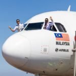 Kuala Lumpur, Malaysia: Capital A, the parent company of AirAsia, has announced the signing of a Memorandum of Understanding (MoU) with Airbus for the purchase of 50 A321XLR aircraft with the option to convert an additional 20 aircraft, bringing the total potential order to 70 aircraft. The agreement was signed during the 2025 Farnborough International Airshow, and marks a key milestone in AirAsia’s strategy to expand its low-cost, long-haul network. Aircraft Capabilities & Strategic Role The Airbus A321XLR (Extra Long Range) is designed to fly up to 8,700 km, enabling airlines to operate longer routes previously not viable with narrow-body aircraft. The introduction of these aircraft will allow AirAsia to open new direct long-haul routes, particularly between Asia, the Middle East, and secondary cities in Europe and North America. According to AirAsia, the A321XLR is a crucial component of its plan to offer cost-effective international connectivity with lower fuel consumption and improved environmental performance compared to widebody aircraft. Long-Haul Expansion Through New Hubs In line with the order, Capital A has also outlined a strategy to establish intermediate hubs in the Middle East, including locations such as Ras Al Khaimah (UAE) and Bahrain. These hubs are expected to serve as connection points for one-stop low-cost flights from Asia to destinations like London Gatwick, Cologne, and Manchester, and potentially cities in the United States. The goal is to replicate AirAsia’s successful point-to-point low-cost model on longer-haul sectors using the fuel-efficient A321XLR. The airline has stated that this expansion is aimed at addressing rising demand for affordable international travel while keeping operational costs competitive. Capital A Financial Restructuring and Integration Plans This announcement comes amid Capital A's broader restructuring initiative. The company is currently merging its short-haul airline business (AirAsia Malaysia) with AirAsia X, its medium-to-long-haul affiliate. This move will unify operations under a single AirAsia brand, streamlining its business model and improving operational efficiency. Capital A has further confirmed plans to exit its PN17 classification, a designation under Bursa Malaysia for financially distressed companies within 2025. The company also plans to issue its first corporate bond by October 2025, signalling investor confidence in its financial turnaround. Group CEO Tony Fernandes said the order aligns with Capital A’s vision to transform AirAsia into a global aviation brand that can compete on ultra-long-haul, cost-efficient routes, while continuing to serve its core ASEAN and Asian markets. Recent Route Developments As part of its regional growth, AirAsia X recently launched direct services to Karachi, Pakistan, achieving an inbound load factor of 95% and 80% outbound on its initial flights. The airline described this as a positive response from the South Asian market and plans to increase frequency depending on demand. In a separate update, AirAsia MOVE (formerly AirAsia Super App) introduced several tech enhancements, including biometric login, dynamic pricing bundles, and promotional campaigns under the tagline "Travel More for Less" across the Thai and ASEAN markets.