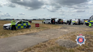 London, United Kingdom: Four people were killed when a medical transport aircraft operated by Zeusch Aviation crashed shortly after takeoff from London Southend Airport on Sunday, July 14. Authorities have confirmed that all four occupants onboard the Beechcraft B200 Super King Air perished in the incident. The UK’s Air Accidents Investigation Branch (AAIB) and Essex Police are continuing a full investigation into the cause of the crash, which occurred just seconds after the aircraft lifted off from Runway 05. Fatalities Confirmed In an official statement released Monday, Essex Police confirmed the deaths of all four individuals aboard. Chief Superintendent Morgan Cronin stated: "Sadly, we can now confirm that all four people on board died. We are working closely with partner agencies, including the Air Accidents Investigation Branch, to recover all available information." Formal identification of the victims is ongoing, and their families are being supported by liaison officers. While official identities have not yet been published by Essex Police, documents reviewed by Britain’s national news agency PA indicate that the deceased included two Dutch pilots, a 31-year-old Chilean-born German flight nurse, and another foreign medical staff member. The nurse, later identified by multiple media outlets as Maria Fernanda Rojas Ortiz, was reportedly on her first day of duty aboard the aircraft. Crash Circumstances The aircraft, registered in the Netherlands and operated by Zeusch Aviation, was performing a medical repatriation flight bound for the Netherlands, following earlier stops in Greece and Croatia. The flight was designated SUZ1. Witnesses and preliminary flight data suggest the aircraft became airborne, banked sharply to the left, inverted, and descended rapidly before crashing into the ground near the airport perimeter. The impact produced a large fireball and thick smoke visible across much of Essex. Emergency services from Essex Police, Fire and Rescue, ambulance services, and Southend Airport personnel responded within minutes. A full cordon was established, and nearby roads were closed as a precaution. A Civil Aviation Authority (CAA) air exclusion zone remains in place over the site. The crash site was secured to facilitate recovery of wreckage, flight recorders, and technical components, which are now being examined by AAIB inspectors. London Southend Airport suspended all flights immediately following the crash. The airport remains closed as of Tuesday, July 15, with no estimated time for reopening announced. Airlines have advised passengers to check for updates and alternative travel arrangements. Investigation Continues The AAIB has deployed a multidisciplinary team to Southend to investigate the circumstances leading to the accident. Both the cockpit voice recorder (CVR) and flight data recorder (FDR) have been located and are undergoing analysis. No preliminary findings have yet been published. In a statement, Zeusch Aviation acknowledged the loss of its crew and support staff and expressed full cooperation with UK authorities: "We are devastated by this tragic event. Our thoughts are with the families of our crew and colleagues. We are assisting investigators and will continue to share relevant updates in due course." Authorities have urged members of the public who witnessed the crash or captured it on video to provide their materials directly to investigators rather than share them on social media. Chief Superintendent Cronin added that the priority now is “to support the families affected and establish the full facts behind what happened.”