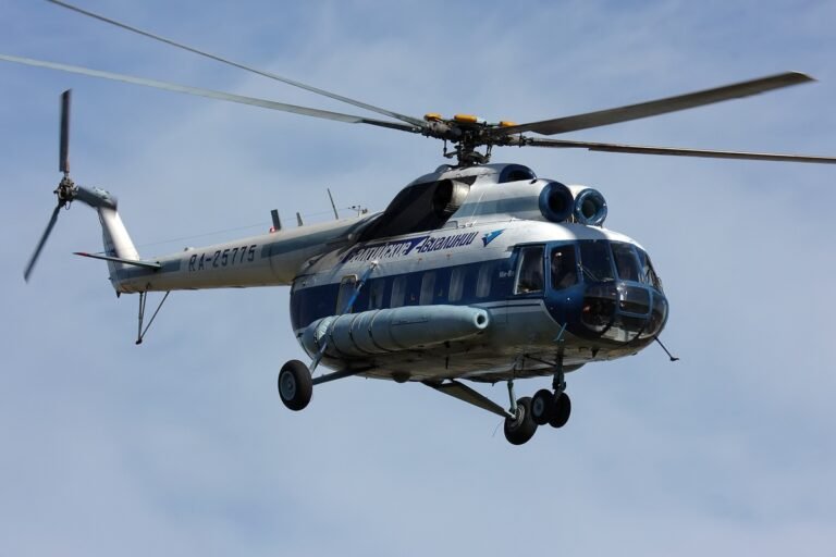 Magadan, Russia: Russian emergency authorities have confirmed the deaths of five people following the crash of a Mil Mi-8 helicopter that went missing earlier this week in the country’s Far Eastern region. The helicopter, operated by Magadan-based civil aviation company APK Vzlyot, had been en route from Chumikan to Magadan on July 14 when it lost radio contact and disappeared from radar. The aircraft was carrying three crew members and two technical staff at the time. Following an intensive search operation, Russia’s Ministry of Emergency Situations (EMERCOM) announced on July 16 that the wreckage was discovered near Cape Gadikan in Khabarovsk Krai, a remote and mountainous coastal area along the Sea of Okhotsk. All five individuals on board were found dead. “The search and rescue team located the aircraft's debris in a hard-to-reach area. There were no survivors,” a spokesperson for the Ministry stated. No Distress Signal Received Officials confirmed that no distress signal had been received from the helicopter prior to its disappearance. The emergency locator beacon reportedly failed to activate, which complicated the initial search efforts. Weather conditions in the region, known for heavy fog and rugged terrain, had also hampered aerial reconnaissance flights during the first two days of the operation. Criminal Investigation Underway Russia’s Investigative Committee has launched a criminal case under Article 263 of the Russian Criminal Code, which addresses violations of safety rules during air transport operations. The probe will focus on whether flight safety regulations were properly followed by the operator. Investigators are currently examining the crash site and are expected to retrieve flight documentation and inspect any recoverable components of the aircraft. There is no official comment yet regarding the helicopter’s technical condition or any preliminary cause of the crash. Background on the Aircraft and Operator The Mi-8 is a Soviet-designed medium twin-turbine helicopter widely used in both civil and military aviation. Despite its age, it remains in extensive service across remote regions of Russia due to its reliability and load-carrying capability. APK Vzlyot, the operator of the downed helicopter, provides cargo and passenger transport services across the Russian Far East. The company has not released a public statement as of this writing but is cooperating with authorities. This is a developing story. Further details will be provided as they are released by EMERCOM, the Investigative Committee, or Rosaviatsiya, Russia’s federal air transport agency.