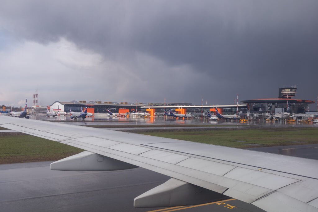 United States: Air travel across the United States experienced major disruption on Monday as severe weather systems swept across multiple states, grounding flights and straining airline operations. According to the latest data from tracking services and airport authorities, over 5,490 flights were delayed and 865 flights canceled as of mid-day, affecting both domestic and international operations. Airports Most Severely Affected The weather-related disruption has impacted some of the country’s busiest aviation hubs. Dallas–Fort Worth International Airport (DFW) recorded the highest number of delays and cancellations, with 648 delays and over 315 cancellations reported. In the Midwest, Chicago O’Hare International Airport (ORD) reported over 417 delays and more than 50 cancellations. The Northeast corridor, a critical region for airline operations, was also significantly affected. Boston Logan International Airport (BOS) saw more than 340 delays, while New York-area airports experienced mounting cancellations and extended ground delays due to active thunderstorms and air traffic management restrictions. In the South, Hartsfield–Jackson Atlanta International Airport (ATL) logged over 450 delays, making it one of the hardest-hit airports in the Southeast. Additional delays were reported at Philadelphia International Airport (PHL), where airlines struggled with storm-related ground stoppages and equipment slowdowns. Airlines Respond to Operational Challenges Major U.S. carriers including Delta Air Lines, American Airlines, United Airlines, JetBlue, and Spirit Airlines have been forced to either cancel or significantly delay flights across their domestic networks. Several airlines activated contingency plans, reassigning crews and equipment to minimize disruption to operations. Airlines have issued advisories for passengers traveling through impacted airports, urging them to check their flight status before leaving for the airport and allowing additional time for check-in and boarding. Many have also offered travel waivers, allowing rebooking without penalty for flights scheduled between July 14 and July 16. FAA Implements Weather-Related Traffic Flow Measures The Federal Aviation Administration (FAA) confirmed that weather-related traffic management initiatives were in place at multiple locations, including Newark Liberty International (EWR), John F. Kennedy International (JFK), and LaGuardia Airport (LGA). These include ground delay programs and flow restrictions to safely manage the volume of aircraft during active thunderstorms and low-visibility conditions. In addition, ground stops were temporarily imposed in parts of Florida, including Orlando, Fort Lauderdale, and Miami, as the storm system extended into the Southeast. Summer Travel Season Compounded by Weather The timing of the disruption comes during one of the busiest travel periods of the year. The summer season has already posed challenges for air traffic control and airport operations, with record passenger volumes, tight crew scheduling, and ongoing staffing pressures. According to data from the U.S. Department of Transportation, travel volumes in July 2025 are trending above pre-pandemic levels, making the impact of operational disruptions more severe for both airlines and travelers. Flight Disruption Likely to Continue Meteorologists have forecast continued storm activity along the East Coast and Midwest through Tuesday, increasing the likelihood of further disruptions. Airlines are urging passengers with flexible travel plans to consider alternative dates. Airport authorities across affected cities have also issued travel advisories and are working with airlines and ground handling teams to manage crowd control and terminal congestion. Passengers are advised to stay updated through airline apps, official airport websites, and the FAA’s real-time flight status portal.