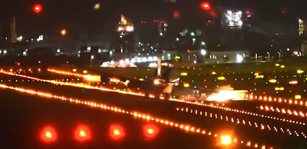 Taipei, Taiwan: A UPS Boeing 747-8F freighter, operating as flight 5X61 from Hong Kong to Louisville via scheduled stops in Taipei and Anchorage experienced a dramatic and potentially serious incident while attempting to land at Taipei Taoyuan International Airport (TPE) amid severe weather from Typhoon Podul. The incident has triggered concern among aviation observers and gone viral on social media.
The aircraft encountered intense gusty winds linked to the typhoon, leading to two aborted landing attempts. On its third approach, the No. 4 engine pod located on the outer section of the right wing struck the runway, generating a burst of sparks and visibly damaging the nacelle.
According to the Aviation Safety Network, UPS flight 5X61 began its first approach to the runway around 7:20 p.m. local time. The pilots aborted the approach to runway 05L and executed a go-around, before scraping the engine during the second attempt. Finally, around 8 p.m., the aircraft touched down and completed its rollout despite the damage. Footage of the incident spread quickly online, prompting widespread attention. The visual captured not only the spark-filled impact but also the challenging weather conditions faced by the crew.  
With Typhoon Podul battering Taiwan, airlines had already canceled or delayed hundreds of flights, and questions are being raised over whether UPS flight 5X61 should have diverted earlier rather than attempt multiple landings in dangerous conditions.
Taiwan’s Civil Aeronautics Administration is expected to launch a formal investigation, reviewing flight data and cockpit recordings to determine the sequence of decisions that led to the runway strike. Until inspections are complete, the aircraft will remain grounded in Taipei. Operational disruption was significant, 180 departures and 141 arrivals were delayed at Taipei that day.
