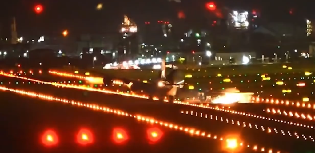 Taipei, Taiwan: A UPS Boeing 747-8F freighter, operating as flight 5X61 from Hong Kong to Louisville via scheduled stops in Taipei and Anchorage experienced a dramatic and potentially serious incident while attempting to land at Taipei Taoyuan International Airport (TPE) amid severe weather from Typhoon Podul. The incident has triggered concern among aviation observers and gone viral on social media. The aircraft encountered intense gusty winds linked to the typhoon, leading to two aborted landing attempts. On its third approach, the No. 4 engine pod located on the outer section of the right wing struck the runway, generating a burst of sparks and visibly damaging the nacelle. According to the Aviation Safety Network, UPS flight 5X61 began its first approach to the runway around 7:20 p.m. local time. The pilots aborted the approach to runway 05L and executed a go-around, before scraping the engine during the second attempt. Finally, around 8 p.m., the aircraft touched down and completed its rollout despite the damage. Footage of the incident spread quickly online, prompting widespread attention. The visual captured not only the spark-filled impact but also the challenging weather conditions faced by the crew. With Typhoon Podul battering Taiwan, airlines had already canceled or delayed hundreds of flights, and questions are being raised over whether UPS flight 5X61 should have diverted earlier rather than attempt multiple landings in dangerous conditions. Taiwan’s Civil Aeronautics Administration is expected to launch a formal investigation, reviewing flight data and cockpit recordings to determine the sequence of decisions that led to the runway strike. Until inspections are complete, the aircraft will remain grounded in Taipei. Operational disruption was significant, 180 departures and 141 arrivals were delayed at Taipei that day.