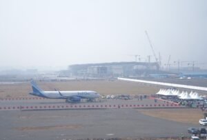New Delhi, India: India’s aviation sector has faced a turbulent start to the year with more than 5,700 flights cancelled in the first six months, largely due to geopolitical tensions and regulatory complications. Data presented by the Ministry of Civil Aviation in the Rajya Sabha showed that between January and June 2025, Indian carriers scheduled 572,079 departures, of which 5,706 were cancelled, accounting for nearly one percent of total flights. Officials said the primary reasons included a brief four-day military conflict with Pakistan in May that forced suspension of civilian operations at several northern airports sharing infrastructure with the armed forces, the ongoing closure of Pakistani airspace for Indian carriers that has disrupted westbound routes to Europe and the Middle East, and wider instability linked to the conflict between Iran and Israel which has further complicated international operations. The cancellations were unevenly distributed across airlines, with IndiGo bearing the heaviest burden, reporting 3,274 cancellations that made up almost 57 percent of the total. The Air India Group, which includes Air India Express, cancelled 1,468 flights, representing about 26 percent of the total. SpiceJet cancelled 401, while Akasa Air saw the lowest disruption with 64 cancellations. According to the ministry, the cancellations not only grounded aircraft but also imposed significant costs on airlines, from increased fuel bills on rerouted flights and extended crew duty hours to additional airport fees, aircraft maintenance delays and rebooking expenses for affected passengers. Under the Directorate General of Civil Aviation’s compensation framework, airlines were required to either refund fares or provide alternate travel arrangements to customers whose flights were disrupted. Despite the disruptions, India’s domestic air travel market continued to expand, with passenger numbers growing by 7.34 percent in the first half of the year compared to the same period in 2024. Analysts said the figures underline the resilience of India’s aviation market, though the financial strain on airlines remains considerable. Air India, in particular, has faced additional operational pressure, cutting about 15 percent of its international long-haul flights and grounding several Boeing Dreamliners for inspections after a recent crash, while also suspending services over Middle Eastern airspace amid escalating regional conflict. Industry observers note that airlines are preparing to recalibrate their schedules in the coming winter season, with some long-haul routes expected to be restored, including Air India’s planned Goa–London Gatwick service. The Ministry of Civil Aviation has said it is working closely with airlines to address regulatory issues, but the cancellations highlight how external shocks beyond the industry’s control continue to ripple through one of the world’s fastest-growing aviation markets. While the 5,706 cancellations amount to just one percent of total scheduled departures, the episode has exposed operational vulnerabilities and reaffirmed that India’s carriers remain at the mercy of geopolitical currents, regulatory bottlenecks, and unpredictable regional conflicts.