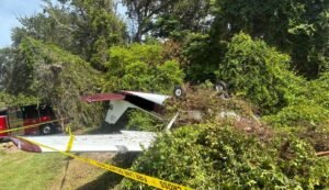 Florida, United States: In Florida, a small aircraft crashed near New Smyrna Beach Municipal Airport on the morning of Friday, August 29. The New Smyrna Beach Fire Department stated that the incident occurred around 10:30 a.m. near the intersection of South Street and Clarendon Avenue, just outside the airport perimeter. Emergency responders from the fire department and local police arrived quickly at the scene. Both individuals on board the aircraft sustained injuries and were transported to Halifax Health Medical Center for treatment. Authorities have not released further details about their conditions. The crash prompted road closures in the surrounding area as first responders secured the scene and conducted rescue operations. Local residents were advised to exercise caution while emergency personnel were on site. At this stage, the cause of the crash has not been publicly disclosed. Aviation authorities are expected to investigate the incident in coordination with the Federal Aviation Administration (FAA) and National Transportation Safety Board (NTSB). The New Smyrna Beach Fire Department emphasized that the area remained restricted to ensure the safety of residents and emergency crews. Meanwhile, in Michigan, a 22-year-old Ohio man was hospitalized following a small single-engine plane crash in a field near Richmond Field in Unadilla Township, Livingston County, on Thursday, August 28. According to the township police, the crash occurred shortly before 4:00 p.m., after a crash detection notification from the pilot’s iPhone and calls from local residents alerted authorities. The pilot, who was flying from Charlevoix to Toledo, was found outside the aircraft with significant injuries and transported to the University of Michigan Hospital. The cause of the crash remains under investigation by the township police, the Federal Aviation Administration (FAA), and the National Transportation Safety Board (NTSB).