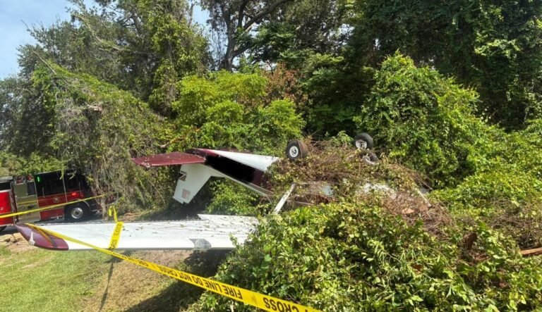 Florida, United States: In Florida, a small aircraft crashed near New Smyrna Beach Municipal Airport on the morning of Friday, August 29. The New Smyrna Beach Fire Department stated that the incident occurred around 10:30 a.m. near the intersection of South Street and Clarendon Avenue, just outside the airport perimeter. Emergency responders from the fire department and local police arrived quickly at the scene. Both individuals on board the aircraft sustained injuries and were transported to Halifax Health Medical Center for treatment. Authorities have not released further details about their conditions. The crash prompted road closures in the surrounding area as first responders secured the scene and conducted rescue operations. Local residents were advised to exercise caution while emergency personnel were on site. At this stage, the cause of the crash has not been publicly disclosed. Aviation authorities are expected to investigate the incident in coordination with the Federal Aviation Administration (FAA) and National Transportation Safety Board (NTSB). The New Smyrna Beach Fire Department emphasized that the area remained restricted to ensure the safety of residents and emergency crews. Meanwhile, in Michigan, a 22-year-old Ohio man was hospitalized following a small single-engine plane crash in a field near Richmond Field in Unadilla Township, Livingston County, on Thursday, August 28. According to the township police, the crash occurred shortly before 4:00 p.m., after a crash detection notification from the pilot’s iPhone and calls from local residents alerted authorities. The pilot, who was flying from Charlevoix to Toledo, was found outside the aircraft with significant injuries and transported to the University of Michigan Hospital. The cause of the crash remains under investigation by the township police, the Federal Aviation Administration (FAA), and the National Transportation Safety Board (NTSB).
