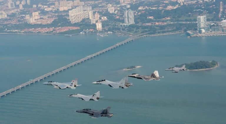 Kuantan, Malaysia: A Royal Malaysian Air Force (RMAF) F/A-18D Hornet fighter jet caught fire during take-off at Sultan Haji Ahmad Shah Airport on Thursday night, prompting both pilots to eject seconds before the aircraft crashed. The incident, which occurred around 9:05 pm, temporarily shut down the airport’s runway and disrupted several commercial flights. The RMAF confirmed in a statement that the twin-seat Hornet suffered a fire during its take-off roll at Kuantan Air Base. “Both pilots successfully ejected and were immediately transported to Tengku Ampuan Afzan Hospital for medical observation,” the Air Force said. Witnesses described the terrifying moment as the aircraft burst into flames, sending smoke billowing into the night sky. One resident said that two loud explosions “sounded like missile strikes” and could be heard nearly a kilometre away. A video of the incident, widely circulated on social media, shows the Hornet engulfed in flames as it attempted to lift off the runway before both crew members ejected. The Civil Aviation Authority of Malaysia (CAAM) declared a temporary “Code Black” runway closure following the accident. In a statement CAAM said the runway would remain shut until 1 pm on Friday, August 22, to facilitate debris clearance and safety checks. The closure affected several scheduled services, including Malaysia Airlines flights MH1268 and MH1269, and Scoot flights TR0470 and TR0471. Passengers were advised to check with their airlines for rebooking arrangements. Prime Minister Datuk Seri Anwar Ibrahim extended his well-wishes to the pilots and urged a comprehensive investigation into the cause of the fire. “This incident must be studied thoroughly to ensure the safety of our airmen and the reliability of our defence assets,” Anwar said, as quoted by Malay Mail. The RMAF has launched a formal probe into the accident. No casualties were reported on the ground, and authorities confirmed that the fire was contained within the air base perimeter. The Boeing F/A-18D Hornet is one of the RMAF’s frontline multirole fighters, acquired in the 1990s. The aircraft has seen extensive service, including participation in regional exercises and maritime patrols. The fleet is currently undergoing phased upgrades as part of Malaysia’s defence modernisation plan. While the immediate priority remains the health of the two aircrew, the investigation will focus on determining whether a mechanical failure, engine malfunction, or other technical issues caused the fire. The findings are expected to inform future operational safety measures for the RMAF’s combat fleet. In a separate incident a month ago, five police officers were injured when their AS355N helicopter crashed into the Pulai River during a nuclear security exercise in Johor. Two officers remain in critical condition and are receiving respiratory support in the Intensive Care Unit at Sultanah Aminah Hospital. The remaining three officers are stable. The Civil Aviation Authority of Malaysia (CAAM) confirmed the crash occurred near the Malaysian Maritime Enforcement Agency (MMEA) Jetty in Gelang Patah.