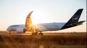 Frankfurt, Germany: Lufthansa Group announced on Monday that it plans to eliminate around 4,000 administrative positions by 2030 as part of a wider restructuring strategy aimed at boosting profitability and efficiency through automation, artificial intelligence, and streamlined operations. In recent years, the airline has faced challenges in controlling costs and driving growth amid labor issues. Last year, it issued two profit warnings and the 8% margin target was postponed to 2028–2030. The job reductions will primarily affect back-office, headquarters, and shared service roles in Germany. Flight operations, including pilots and cabin crew, are not expected to be impacted. The decision was unveiled during Lufthansa’s Capital Markets Day, the airline’s first in six years where executives presented new financial targets. The group now aims for an adjusted operating margin of 8 to 10 percent by 2028, annual free cash flow exceeding €2.5 billion, and a 15 to 20 percent return on capital employed before taxes. Alongside workforce cuts, Lufthansa confirmed plans to modernize its fleet with the delivery of more than 230 new aircraft by the end of the decade, including about 100 long-haul planes. Management said the investments, combined with digitalization, will drive efficiency across its airlines: Lufthansa, Swiss, Austrian Airlines, Brussels Airlines, ITA Airways, and Eurowings. Chief Executive Carsten Spohr emphasized the need for structural change, noting that consolidation of overlapping functions and the use of digital tools will “make the group more competitive and resilient.” The announcement sparked criticism from German labor unions. Representatives from Ver.di, one of the country’s unions, warned of the social consequences of the cuts and demanded government oversight. Markets, however, reacted positively. Lufthansa’s shares rose nearly 2 percent following the announcement, reflecting investor confidence in the group’s ability to deliver stronger returns. The company stressed that the job reductions will be gradual and spread over five years, easing the transition for employees and giving time to implement retraining or redeployment measures. On the contrary, earlier this year, Lufthansa had announced plans to hire approximately 10,000 new employees throughout 2025. The recruitment drive covered a wide range of roles, including more than 2,000 flight attendants, 1,400 ground operations staff, 1,300 technical experts, 1,200 administrative roles, and around 800 pilot positions. A significant portion of these new jobs was expected to be located in Germany, reflecting Lufthansa’s efforts to strengthen its domestic operations. Among its subsidiaries, Lufthansa Technik alone planned to add over 2,000 staff, while Austrian Airlines and Eurowings each aimed to hire roughly 700 employees. The group reported that in 2024 it had onboarded more than 13,000 new employees and, over a three-year period, had hired over 30,000 staff globally.