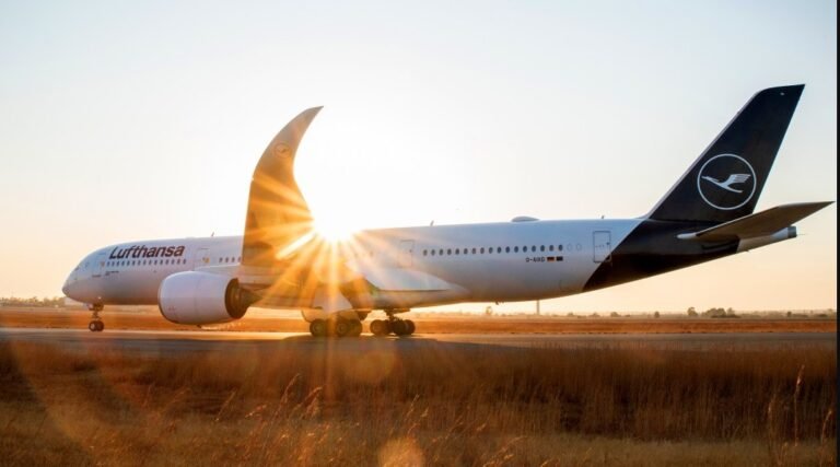 Frankfurt, Germany: Lufthansa Group announced on Monday that it plans to eliminate around 4,000 administrative positions by 2030 as part of a wider restructuring strategy aimed at boosting profitability and efficiency through automation, artificial intelligence, and streamlined operations. In recent years, the airline has faced challenges in controlling costs and driving growth amid labor issues. Last year, it issued two profit warnings and the 8% margin target was postponed to 2028–2030. The job reductions will primarily affect back-office, headquarters, and shared service roles in Germany. Flight operations, including pilots and cabin crew, are not expected to be impacted. The decision was unveiled during Lufthansa’s Capital Markets Day, the airline’s first in six years where executives presented new financial targets. The group now aims for an adjusted operating margin of 8 to 10 percent by 2028, annual free cash flow exceeding €2.5 billion, and a 15 to 20 percent return on capital employed before taxes. Alongside workforce cuts, Lufthansa confirmed plans to modernize its fleet with the delivery of more than 230 new aircraft by the end of the decade, including about 100 long-haul planes. Management said the investments, combined with digitalization, will drive efficiency across its airlines: Lufthansa, Swiss, Austrian Airlines, Brussels Airlines, ITA Airways, and Eurowings. Chief Executive Carsten Spohr emphasized the need for structural change, noting that consolidation of overlapping functions and the use of digital tools will “make the group more competitive and resilient.” The announcement sparked criticism from German labor unions. Representatives from Ver.di, one of the country’s unions, warned of the social consequences of the cuts and demanded government oversight. Markets, however, reacted positively. Lufthansa’s shares rose nearly 2 percent following the announcement, reflecting investor confidence in the group’s ability to deliver stronger returns. The company stressed that the job reductions will be gradual and spread over five years, easing the transition for employees and giving time to implement retraining or redeployment measures. On the contrary, earlier this year, Lufthansa had announced plans to hire approximately 10,000 new employees throughout 2025. The recruitment drive covered a wide range of roles, including more than 2,000 flight attendants, 1,400 ground operations staff, 1,300 technical experts, 1,200 administrative roles, and around 800 pilot positions. A significant portion of these new jobs was expected to be located in Germany, reflecting Lufthansa’s efforts to strengthen its domestic operations. Among its subsidiaries, Lufthansa Technik alone planned to add over 2,000 staff, while Austrian Airlines and Eurowings each aimed to hire roughly 700 employees. The group reported that in 2024 it had onboarded more than 13,000 new employees and, over a three-year period, had hired over 30,000 staff globally.