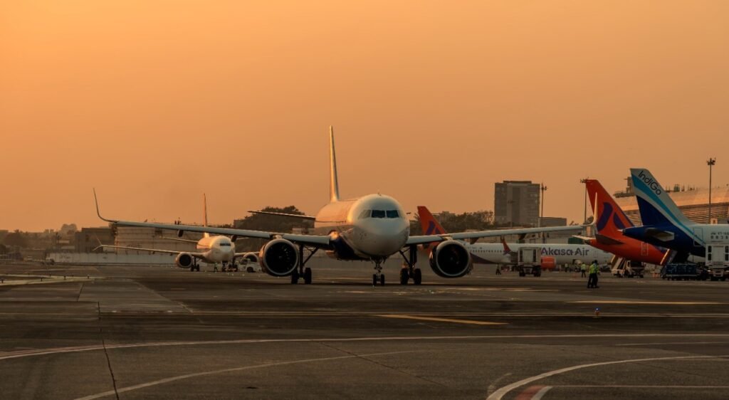 New Delhi, India: A new report by Knight Frank, forecasts a remarkable rise of almost 50% in India’s annual air passenger traffic over the next five years. Passenger numbers are projected to escalate from 412 million in FY25 to 600 million by FY30. According to the report, this substantial jump will drive a sharp increase in aeronautical revenues, driven by both higher passenger counts and enhanced spending per traveler. A major highlight of the analysis involves non-aeronautical revenue streams which include retail, food and beverage, duty-free shopping, parking, advertising, and real estate leasing. Airports operating under the public–private partnership (PPP) model are pivotal: while they handle 64% of India’s total air traffic, they generate a dominant 87% of the nation’s non-aero revenue. The report also spotlights the performance of India’s busiest airports, Mumbai Airport earns approximately USD 20.1 per passenger from non-aero sources. Delhi Airport closely trails with about USD 18.1 per passenger. These numbers are impressively close to global aviation giants like London Heathrow (USD 21.6) and Tokyo Haneda (USD 19.9). Knight Frank's analysis emphasizes that India’s airports are now at a strategic crossroads. With passenger volumes expected to soar to 600 million by FY30, financial sustainability will increasingly depend on diverse revenue models. The report urges airport developers and operators to move beyond traditional infrastructure approaches and adopt the concept of aerocities integrated commercial hubs encompassing retail, hospitality, leasing, and other services turning airports into urban growth engines, not just transit points. The projected surge in air travel offers both significant opportunities and challenges. Operators must balance capacity expansion with revenue diversification to ensure long-term resilience as passenger numbers climb.