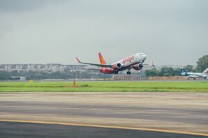 New Delhi, India: The GST Council on September 3, 2025, announced a revised two-tier GST structure, set to come into effect from September 22, 2025, impacting air travel and luxury services. Under the new system, most goods and services will attract either 5% or 18% GST, while select luxury and “sin” items will be taxed at 40%. For air travel, the changes are as follows: Economy class tickets: Continue at 5% GST, unchanged from previous rates. Premium economy, business, and first-class tickets: Previously taxed at 12% GST, these fares will now attract 18% GST, increasing the cost for premium travelers. For example, a business class ticket booked on September 4, 2025, for travel on September 24, 2025, will attract the old 12% GST, while the same ticket booked on or after September 23, 2025, will incur the new 18% GST. The Finance Ministry clarified under Section 14(a)(i) of the CGST Act, 2017, that GST liability is determined by the time of supply: If goods or services are supplied before the rate change but invoiced afterward, GST depends on the time of supply. Payment after the rate change: time of supply is the earlier of the invoice date or payment receipt date. Payment before the rate change: time of supply is the payment receipt date. The GST on private jets, helicopters, yachts, and pleasure vessels has increased from an effective 31% (28% GST + 3% cess) to a flat 40% GST, eliminating the cess and raising costs for high-end travelers and operators. According to PTI, The International Air Transport Association (IATA) expressed disappointment over the increase in GST on non-economy travel. “Aviation has significant potential to boost India’s economy, both through airline growth and improved connectivity. It is therefore disappointing to increase GST on non-economy travel without clear justification,” said Sheldon Hee, IATA’s Asia Pacific regional vice-president. He added that the tax on premium travel has more than doubled since 2017 and warned that such increases could dampen demand and affect airline profitability, especially since premium travelers often determine a route’s viability. Airlines are expected to pass on the higher GST to passengers, making premium tickets more expensive. Meanwhile, economy travelers benefit from stable fares, with GST unchanged at 5%. The revised structure aims to simplify taxation while ensuring that revenue from luxury and non-essential services contributes to public finances.