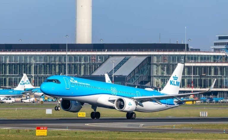 Amsterdam, Netherlands: Dutch flag carrier KLM will cancel dozens of flights on Wednesday, September 17, as ground staff at Amsterdam’s Schiphol Airport prepare for a four-hour strike. The work stoppage, announced by trade unions FNV and CNV, will take place between 08:00 and 12:00 local time (CEST) and is expected to cause significant disruption to operations at one of Europe’s busiest hubs. The strike affects employees responsible for critical ground operations such as baggage handling, towing aircraft, and assisting passengers. Schiphol Airport has warned travelers to brace for delays, cancellations, or changes to their flights, advising passengers to closely monitor flight status before heading to the airport. KLM confirmed that it has already cancelled dozens of flights ahead of the strike to limit the scale of disruption. According to a report in NL Times, the airline has proactively adjusted its schedule after a similar action last week, when a two-hour strike led to the cancellation of over 100 flights and affected nearly 27,000 passengers. Unions representing the workers say the industrial action stems from disputes over wages, workload, and job classifications. They argue that ground staff perform heavy physical tasks but receive lower pay compared to other airport roles. “These workers keep Schiphol running under difficult conditions, yet they are not fairly rewarded,” union representatives stated. The strike is part of a broader wave of labor unrest at European airports, as aviation workers push for higher wages amid rising operational costs and inflationary pressures. With Schiphol serving as a major intercontinental hub, the disruption is expected to ripple across connecting flights throughout Europe, Asia, and North America. Passengers flying on or around September 17 are strongly advised to check their flight status directly with KLM or via Schiphol’s website and consider flexible travel arrangements where possible.