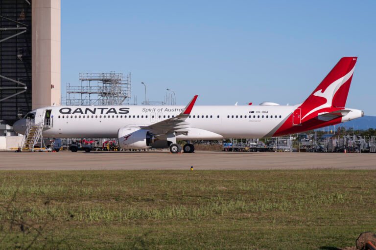 Canberra, Australia: In a landmark move, Qantas has launched commercial operations with its first two Airbus A321XLRs, becoming the first airline in the Asia-Pacific region to introduce the model into revenue service. The aircraft, designated “Great Ocean Road” (VH-OGA) and “Outback Way” (VH-OGB), commenced service on 25 September, initially operating the Sydney–Melbourne and Sydney–Perth routes. The names reflect the airline’s tradition of celebrating Australia’s iconic landscapes. Qantas Group CEO Vanessa Hudson noted the scale of preparation required for the launch: “Preparing for these commercial flights has taken an enormous effort, with nearly 350 training flights and more than 40,000 hours of training completed, as well as thousands of pieces of equipment deployed across our network.” Beyond its domestic deployment, the A321XLR’s extended range opens up new possibilities. With a maximum range of approximately 8,700 km, about 3,000 km beyond that of the Boeing 737-800, the aircraft is seen as a bridge between domestic and short-to-medium international flights into Southeast Asia and beyond. Hudson said Qantas plans to roll out the jets on additional domestic and international routes as more units enter service. The two aircraft carry 197 seats in a two-class format 20 in Business and 177 in Economy which amounts to a 13 percent increase in capacity compared to Qantas’s 737-800 fleet (without reducing seat pitch). Notably, the number of Business seats has increased by 66 percent over earlier models. The A321XLRs are powered by Pratt & Whitney Geared Turbofan engines. Looking ahead, Qantas expects to receive a third A321XLR in November 2025, bringing the total in service to seven by June 2026. In August 2025. Earlier Qantas placed an order for 20 more A321XLRs, pushing its total commitment to 48 aircraft. These aircraft form a key component in Qantas’s largest-ever fleet renewal program, which totals more than 200 firm orders plus additional purchase options from both Airbus and Boeing.