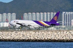 Bangkok, Thailand: Thai Airways International is preparing to retire its First Class service within the next two to three years, opting instead to invest in an upgraded Business Class as part of a sweeping fleet and product modernization plan. The national carrier’s Chief Executive Officer, Chai Eamsiri, confirmed the decision during a recent briefing, framing it as a move toward long-term efficiency and competitiveness. “We plan to eliminate First Class and replace it with enhanced Business Class cabins. It is part of our strategic plan to improve our product consistency and align with passenger demand,” he said. At present, Thai Airways operates a mixed product that includes Economy, Premium Economy, Business (“Royal Silk”), and First Class (“Royal First”) on select Boeing 777-300ER aircraft. The airline intends to streamline this into a three-class offering: Economy, Premium Economy, and an elevated Business Class. The airline will gradually refurbish its wide-body fleet, particularly the Boeing 777-300ERs, to remove First Class suites and replace them with a next-generation Business product. This new “Business Plus” concept is expected to include more spacious seating in the front row, enhanced privacy potentially with doors and upgraded amenities. While First Class is being phased out, Thai Airways aims to bridge the gap by enriching its Business Class service.The airline has already begun introducing premium amenities into Business, including caviar service on select routes. This aligns with a wider industry trend in which airlines consolidate luxury offerings into an expanded Business Class product rather than maintaining costly, limited-use First Class cabins. Passenger demand also played a decisive role.The modern Business Class products now rival traditional First Class in terms of comfort and privacy, making the higher-cost cabin less attractive and less financially sustainable for carriers. Thai Airways’ shift is also tied to its broader fleet renewal strategy. New aircraft on order, such as Boeing 787-9 Dreamliners, will be delivered without First Class cabins. The carrier is also retrofitting its existing fleet to ensure product consistency. Maintaining First Class across just a handful of aircraft and routes such as Bangkok to London and Tokyo has become impractical. Rationalizing the fleet is expected to lower operating costs and simplify scheduling.