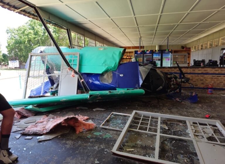 Alberton, South Africa: A routine training flight turned into a near-tragedy on Sunday afternoon when a light aircraft crashed into the tuckshop of Hoërskool Alberton in the City of Ekurhuleni, Gauteng. Both the student pilot and the instructor miraculously escaped without injuries, while no learners or staff at the school were harmed. The aircraft experienced engine failure during a final evaluation flight for a private pilot licence. The instructor attempted an emergency landing on the school’s rugby field, but the plane veered off and struck the school’s tuckshop. Images from the scene showed extensive damage to the small building, with firefighters and emergency responders quickly arriving to secure the crash site. The City of Ekurhuleni Disaster and Emergency Management Services confirmed that no fire broke out after impact, and both occupants were able to walk away from the wreckage. Eyewitnesses reported hearing the sound of a struggling engine moments before the aircraft went down. “We heard the engine sputter, then a loud thud. It was terrifying,” said a resident living near the school. The South African Civil Aviation Authority (SACAA) has opened an investigation into the incident to determine the cause of the reported power loss and assess whether any mechanical or procedural failures contributed to the crash. The Gauteng Department of Education (GDE) said the accident will not disrupt ongoing matric examinations. "We are relieved that there were no casualties. Classes and exams will continue as planned," the department said in a statement. Aviation experts say the outcome was “nothing short of a miracle,” crediting the instructor’s quick decision-making for preventing a greater tragedy in a densely populated area. The aircraft type, registration number, and operator have not yet been disclosed by authorities pending the official SACAA preliminary report. Recent Light Aircraft Crashes in Africa 2025 16 October 2025: Two light aircraft crashed in the KwaZulu-Natal Midlands region (Howick / Nottingham Road); two pilots died. 13 October 2025: 20-year-old Indian pilot trainee Piyush Pushp died during a solo training flight at Johannesburg in Vulcan Aviation Academy in South Africa. 14 August 2025: A light aerobatic aircraft (Extra 300, registration ZS-AEC) crashed into the sea off Durban North Beach during an airshow; pilot killed (body later found). 7 August 2025: A light aircraft operated by AMREF Flying Doctors (Cessna 560XL) crashed in Mwihoko estate, Kiambu County, Kenya; six people killed (four onboard + two on the ground). 9 June 2025: In KwaZulu-Natal, South Africa, a light aircraft crashed near Greytown during a training flight; three people on board died. 18 May 2025: A light aircraft (Rans S10 Sakota, registration ZS-WXE) crashed shortly after take-off at Middelburg Airfield, Mpumalanga, South Africa; two people died (the pilot and passenger).