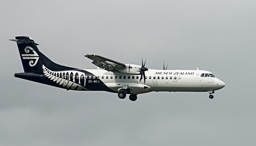 Auckland, New Zealand: On October 14, 2025, Air New Zealand Flight NZ5095, a regional ATR turboprop aircraft, was forced to return to Auckland approximately 40 minutes into its flight to Taupō. Pilots received a system alert indicating a potential technical issue, prompting a precautionary return to base for engineering inspection. The aircraft landed safely at Auckland Airport at around 5:35 PM local time, without declaring an emergency. No injuries were reported among passengers or crew. Following the return, the aircraft underwent a full inspection by engineering teams. While the exact nature of the system alert was not disclosed, Air New Zealand confirmed that the decision to return was in line with standard safety procedures. Affected passengers were rebooked on the next available flights to Taupō, and the airline provided necessary assistance to minimize disruption. This incident follows a similar occurrence on October 5, 2025, when Flight NZ3, a Boeing 777-300ER operating from Los Angeles to Auckland, returned to Los Angeles shortly after takeoff due to an electrical fault affecting the aircraft's power distribution system. Passengers experienced rising cabin temperatures and a temporary loss of in-flight entertainment. The aircraft landed safely, and engineers conducted an extensive inspection before clearing it for future operations. Air New Zealand emphasized that these precautionary returns reflect the airline's commitment to passenger safety and adherence to standard safety protocols. The airline's Chief Operating Officer, Alex Marren, stated, "All actions taken were consistent with standard safety procedures," and reiterated that passenger safety remains the airline's top priority.