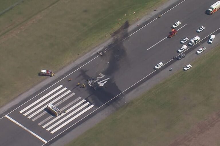 Shellharbour Airport, plane crash, light aircraft crash, Piper Saratoga, Andrew Connors, Bathurst flight, NSW plane crash, aviation accident, Australia news, emergency services, Fire and Rescue NSW, Rural Fire Service, ATSB investigation, aircraft fire, three dead, aviation tragedy, pilot killed, aviation safety, flight accident, aviation incident, news update, Shellharbour news, New South Wales news, aviation reporting, crash investigation, aviation safety authorities, aviation news Australia, aviation disaster, crash aftermath, air safety, fatal plane crash, aviation emergency, NSW news, flight disaster, aviation fatalities, air crash, aircraft accident, pilot death, passenger fatalities, aviation authorities, plane accident news, emergency response, aviation coverage, NSW police, aviation investigation, aviation alert, light plane accident, aviation crash report, Shellharbour Airport crash, Piper aircraft crash, Bathurst flight crash, aviation headlines, aviation breaking news, NSW aviation, private plane crash, plane takes offv