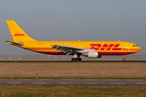 London, United Kingdom: On October 12, 2025, a DHL-operated Airbus A300 (registration D-AEAG) suffering a tailstrike during a go-around at London Heathrow Airport on October 12, 2025, has garnered significant attention. Flight QY2212 from Leipzig was attempting to land on Runway 09L when the aircraft experienced a tailstrike. Despite deploying thrust reversers and spoilers, the pilots initiated a go-around, a maneuver that typically requires the reversal of these systems. The aircraft then climbed to 4,500 feet and safely landed on Runway 09R approximately 17 minutes later. Some experts speculate that improper cargo loading or shifting could have contributed to the instability during landing. Others point to pilot-induced factors, noting the significant nose-up inputs observed during the approach. A video capturing the incident has been widely shared, providing visual insight into the aircraft's approach and subsequent go-around. The footage has sparked discussions about the appropriateness of the go-around decision given the deployment of reverse thrust and spoilers. While the aircraft landed safely, the incident has prompted a review of the procedures and decisions made during the approach and go-around phases. Further investigations may provide more clarity on the factors leading to this unusual incident.