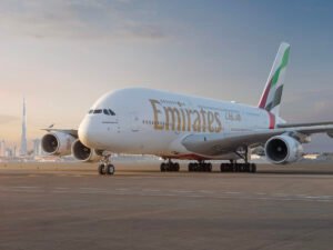 Dubai, United Arab Emirates: Emirates Airline has announced a significant update to its in-flight safety regulations, prohibiting passengers from using power banks to charge electronic devices onboard all flights, effective since October 1, 2025. The move comes after a safety review following growing concerns over lithium-ion battery incidents in aviation. The airline has outlined specific guidelines to ensure compliance and passenger safety: Prohibited Usage: Passengers are not allowed to use any power bank to charge devices during flights. Carry-On Allowance: Travelers may carry one power bank per person with a capacity under 100 watt-hours (Wh). Charging Restrictions: Power banks cannot be recharged using aircraft power outlets. Storage Guidelines: Power banks must be stored in the seat pocket or under the seat, and are not permitted in overhead compartments. Checked Baggage: Power banks remain strictly prohibited in checked luggage. Emirates confirmed that in-seat charging ports remain available on all aircraft. Passengers are advised to fully charge their devices prior to departure, especially on long-haul flights. Lithium-ion batteries, commonly used in power banks, have been linked to thermal runaway incidents, where batteries can overheat or catch fire if damaged, overcharged, or improperly handled. Although such events are rare, Emirates cited passenger safety as the primary reason for the new restriction. Emirates’ decision aligns with a global trend in the aviation industry toward stricter regulations on portable lithium-ion batteries. International authorities, including the International Civil Aviation Organization (ICAO), and several airlines worldwide have introduced similar measures to mitigate potential fire risks onboard aircraft. Passengers are advised to check their devices and power banks before travel, ensure compliance with the airline’s capacity limits, and carry only one approved power bank per person. Airline staff will enforce the new guidelines at check-in and boarding points.