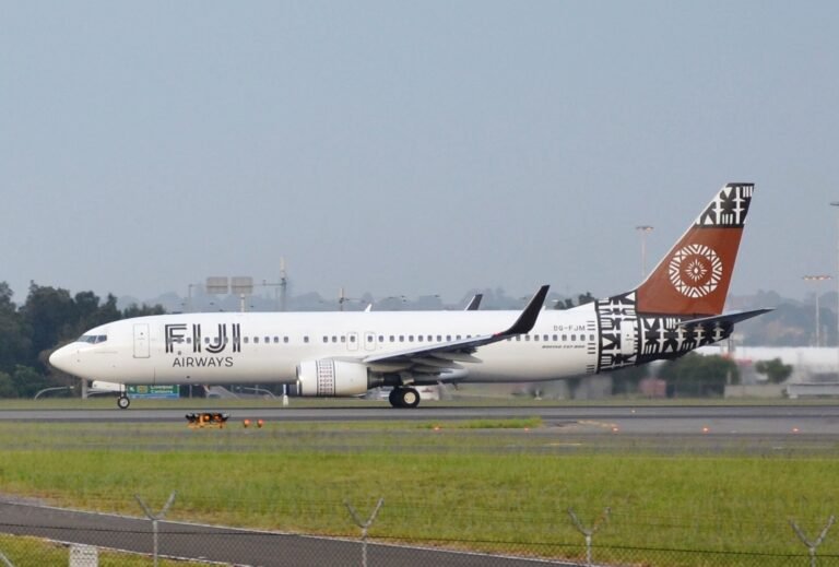 Christchurch, New Zealand: A Fiji Airways flight, FJ450, experienced a bird strike shortly after takeoff from Christchurch Airport on Thursday, October 9, 2025. The aircraft, a Boeing 737-800, was en route to Nadi, Fiji, when it encountered the incident around 2:00 PM, Thursday. The Civil Aviation Authority (CAA) reported that the plane likely struck a substantial flock of birds. As a precaution, the flight crew initiated a holding pattern above Canterbury to burn fuel and reduce the aircraft's weight, ensuring a safe return to Christchurch. The plane landed safely at approximately 4:45 PM, with no injuries reported among the 170 passengers and crew on board. Fiji Airways confirmed that all passengers and crew were safe. The airline's engineering team conducted necessary inspections and maintenance checks on the aircraft. Reservations and customer care teams assisted affected passengers with new travel arrangements and onward connections. The airline apologized for the inconvenience and emphasized that safety remains its highest priority. Images from the incident show visible damage to the aircraft's nose cone, including a large dent that marks the severity of the bird strike. The Civil Aviation Authority (CAA) stated that bird strikes are a recognized aviation risk, and flight crews are properly trained and equipped to handle them safely. Both the airline and the airport adhered to established safety protocols, and the CAA will coordinate with them to review the incident and determine any necessary follow-up actions.