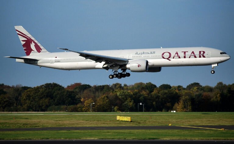 Ahmedabad, India: A Qatar Airways flight operating from Doha to Hong Kong declared a full emergency on Tuesday afternoon and made a precautionary landing at Ahmedabad’s Sardar Vallabhbhai Patel International Airport (SVPIA) after the aircraft reportedly experienced a sudden loss of cabin pressure. According to airport officials, Flight QR 816, operated by a Boeing 777-300ER (registration A7-BOB), was cruising through Indian airspace when the crew detected abnormal cabin pressure levels. At 2:12 p.m. (IST), Ahmedabad Air Traffic Control declared a full emergency, activating standard response protocols and alerting ground services, medical units, and firefighting teams. The aircraft landed safely at 2:32 p.m., and the emergency status was withdrawn six minutes later, once engineers confirmed there was no immediate safety threat. All passengers and crew members onboard were reported safe, with no injuries or medical emergencies. “The aircraft landed safely in Ahmedabad following a technical issue,” a Qatar Airways spokesperson said in a brief statement. “All passengers are being looked after, and the aircraft is currently undergoing maintenance checks before resuming operations.” Airport authorities confirmed that normal flight operations continued uninterrupted during and after the emergency response. Qatar Airways’ engineering team initiated a detailed inspection to determine the cause of the technical fault related to the cabin pressure system. Preliminary assessments suggested a pressurization system malfunction, but the airline has yet to release an official statement on the cause.