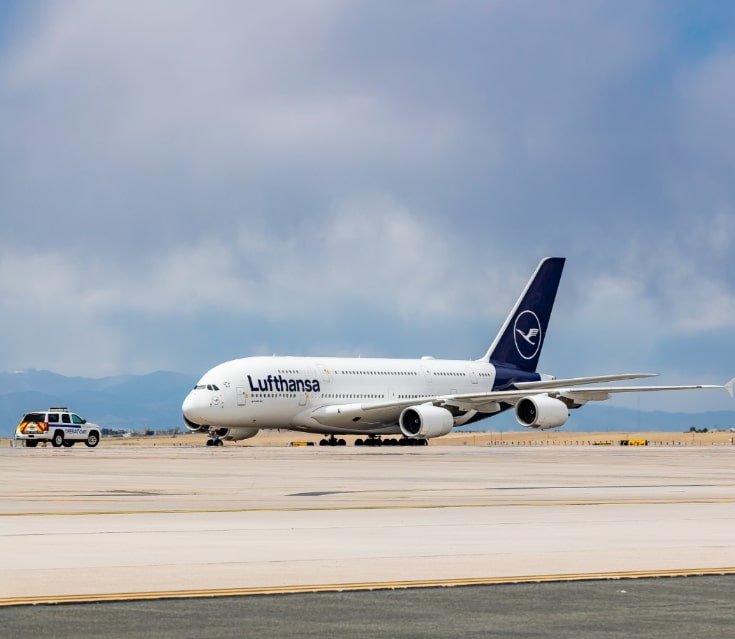 Berlin, Germany: Two of Europe’s leading carriers Lufthansa and Ryanair are scaling back their operations in Germany, citing rising aviation taxes, airport charges, and regulatory costs that have rendered several domestic and regional routes economically unviable. Budget carrier Ryanair has confirmed plans to cut approximately 800,000 seats across its German winter schedule, removing 24 routes and reducing flights at nine airports, including Berlin, Hamburg, and Memmingen. The airline attributed its decision to what it calls “excessive access costs” that continue to undermine the country’s competitiveness within Europe’s aviation landscape. “Germany has priced itself out of growth,” a Ryanair spokesperson said in a statement. “While other European markets have reduced aviation taxes to support recovery, Germany continues to impose high charges that discourage airlines from adding capacity.” Ryanair has reiterated that it will redirect aircraft and capacity to other European countries unless the German government acts to reduce its aviation levies and air traffic control fees. The carrier’s decision follows the closure of smaller German bases such as Dortmund, Dresden, and Leipzig, which remain excluded from the upcoming winter operations. National flag carrier Lufthansa is also taking significant measures to curb costs, planning to cut around 100 domestic flights per week this winter. The airline’s leadership has warned that high “location costs” including fuel surcharges, airport fees, and environmental levies are eroding profitability on short-haul routes. Lufthansa CEO Carsten Spohr has publicly voiced concerns over Germany’s aviation competitiveness, warning that continued cost escalation could force deeper reductions in the carrier’s domestic schedule by next summer. “Our cost base in Germany is among the highest in Europe. Without structural reforms, airlines will inevitably reconsider the scale of their operations here,” Spohr said. Lufthansa’s adjustments are part of a wider trend of airlines reassessing capacity deployment in high-cost markets, as European carriers continue to battle inflationary pressures and environmental surcharges. The dual retrenchment by Lufthansa and Ryanair has reignited debate over Germany’s aviation tax policy. Industry observers note that Berlin’s failure to deliver on its earlier pledge to lower aviation taxes has worsened the country’s cost environment. Germany’s aviation tax, introduced to curb emissions and raise revenue, remains among the highest in Europe. Analysts warn that these levies combined with rising fuel costs and environmental compliance expenses risk undermining the post-pandemic recovery of the country’s aviation sector. Ryanair’s capacity reduction alone accounts for nearly 10% of its total planned German seat supply this winter, a significant setback for airports already struggling with traffic stagnation.