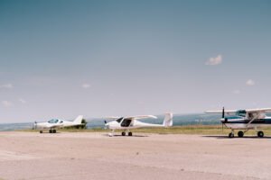New Delhi, India: The Ministry of Civil Aviation (MoCA) is set to convene a comprehensive review meeting with India’s flying training organisations (FTOs) after the DGCA had announced on July 9 the launch of a bi-annual ranking system for flying training organisations nationwide, effective by 1 October 2025 and then the Directorate General of Civil Aviation (DGCA) released its first-ever ranking report, revealing that none of the country’s training academies met the top performance standards. According to the DGCA’s assessment, covering the period from September 1, 2024, to August 31, 2025, none of the 35 evaluated flying schools achieved an “A+” or “A” grade. The rankings placed 13 FTOs in the ‘B’ category and 22 in ‘C’, indicating widespread gaps in operational efficiency, safety practices, and training quality. The grading framework classified institutions based on their overall performance: A+ (85% and above) A (70–84.99%) B (50–69.99%) C (below 50%) A senior ministry official said the upcoming review will focus on identifying systemic shortcomings and developing corrective measures. “The objective is to improve training quality and ensure that India’s flying schools meet international standards in safety, efficiency, and student outcomes,” the official stated. FTOs placed in the “C” category have been directed to undertake self-assessment exercises and submit improvement plans to the DGCA within a stipulated timeframe. The aviation regulator is expected to monitor compliance closely and provide targeted support to address performance deficiencies. Civil Aviation Minister K. Rammohan Naidu has emphasised that the ranking initiative aims to promote transparency and accountability within the pilot training ecosystem. The DGCA will now publish rankings every six months, with the next report scheduled for April 1, 2026. The government’s move comes at a time when India is witnessing a growing demand for pilots to support the expanding civil aviation sector. Strengthening training infrastructure and ensuring adherence to regulatory standards are seen as key priorities to meet this demand sustainably.