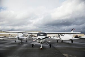 New Delhi, India: The Directorate General of Civil Aviation (DGCA) has unveiled a formal ranking framework for all DGCA-approved Flying Training Organisations (FTOs), which will come into effect from 1 October 2025. The new system, published in a public notice on 30 September, will be released bi-annually, with the next edition scheduled for 1 April 2026. Designed around a points-based evaluation, the framework measures FTOs on five core parameters: performance, operational strength, safety, compliance, and student support. Rankings Of Flying Training Organizations: Category A+ No FTOs featured in this category. Category A No FTOs featured in this category. Category B Chimes Aviation Academy SVKM’s NMIMS Academy of Aviation Shirpur Bihar Flying Club Orient Flights Aviation Academy Skynex Aero Pvt. Ltd. FSTC Flying School Pvt. Ltd. Patiala Aviation Club Haryana Institute of Civil Aviation Jet Serve Aviation Pvt. Ltd. Nagpur Flying Club National Flying Training Institute Banasthali Vidyapith Gliding and Flying Club Rajiv Gandhi Academy for Aviation Technology Category C Dunes Aviation Academy Garg Aviations Ltd. The Bombay Flying Club Chetak Aviation Ekvi Air Training Organisation Pvt. Ltd. Academy of Carver Aviation Pvt. Ltd. Ambitions Flying Club Pvt. Ltd. Flytech Aviation Academy Indian Flying Academy Sha-Shib Flying Academy Government Aviation Training Institute Indira Gandhi Rashtriya Uran Akademi (IGRUA) Redbird Flight Training Academy Telangana State Aviation Academy Alchemist Aviation Private Limited Falcon Aviation Academy Wings Aviation Pvt. Ltd. Asia Pacific Flight Training Academy Limited The Gujarat Flying Club The Madhya Pradesh Flying Club Ltd. Pioneer Flying Academy Pvt. Ltd. Blue Ray Aviation Pvt. Ltd. The inaugural ranking covers the period from 1 September 2024 to 31 August 2025 and applies to all FTOs that had completed at least 18 months of approval by the cut-off date. Even training institutes that faced temporary suspensions during this period have been included. The grading system is divided into four categories: A+ (85% and above), A (70%–84%), B (50%–69%), and C (below 50%). Those in Category C will be issued notices by the regulator, requiring them to conduct self-assessment and take corrective measures. Majority of Flight Schools in Category C Raises Concerns The inaugural results reveal a concerning scenario: no FTO achieved an A+ or A grade, while the majority of flight schools were placed in Category C. Only a few institutions managed to secure Category B. The DGCA’s inaugural FTO rankings have raised serious concerns for the future of pilot training in India. With most flying schools underperforming and the majority falling into Category C, the country risks producing pilots who may not be fully prepared for next-generation aircraft, eVTOLs, and advanced aviation technologies. Low scores in safety, operational efficiency, and compliance further raise the possibility of heightened risks in training operations, potentially affecting commercial aviation standards in the future. As India’s aviation sector expands rapidly, failing to improve FTO performance could lead to a significant pilot shortfall, challenging both domestic and international airline growth. DGCA Introduced FTO Ranking System Earlier in March, the Directorate General of Civil Aviation (DGCA) announced its plan to introduce a ranking system for Flying Training Organisations (FTOs) in India. The proposed framework aims to evaluate flight schools based on multiple performance metrics, including the average time students take to obtain a Commercial Pilot License (CPL). This move comes amid rapid growth in India’s aviation sector, which has heightened demand for skilled pilots. Later in July 2025, following its March announcement, the DGCA moved forward with implementing the FTO ranking system that will be effective from 1st October 2025 and will evaluate FTOs on infrastructure, safety, operational performance, and student support, categorizing them into A++, A+, A, or B grades. FTOs in Category B will be required to undertake self-assessment and improvement measures. The move also follows concerns over flight training accidents this year, stressing on the need for stricter oversight and safety standards. Key Metrics Behind India’s FTO Ranking System DGCA explained that the scoring is distributed across key pillars: 20% for FTO performance, 40% for operational aspects, 20% for safety standards, 10% for compliance, and 10% for student assistance. Performance indicators include the average time for trainees to complete 175 flying hours, aircraft utilization, and course completion rates. Operational strength focuses on student-to-aircraft and student-to-instructor ratios, fleet capacity, maintenance resources, and availability of simulators and ground training. Safety remains a critical factor, with accidents or serious incidents resulting in zero marks for that parameter. Non-reporting of incidents will invite a penalty of five marks for each unreported case. The framework also incorporates compliance monitoring and student welfare. Institutions are expected to maintain transparent grievance redressal systems, offer financial or placement support, and ensure clarity in fee structures and refunds. By formalizing this ranking system, DGCA aims to drive accountability, strengthen safety culture, and raise training standards in India’s pilot pipeline. DGCA Ranking Phase Excludes Certain Flight Schools Exclusions from the current phase includes Avyanna Aviation Academy, Vision Flying Training Institute, Aviation Connectivity Infrastructure Developers Pvt. Ltd. and Jharkhand Flying Institute these were not ranked as it had not completed 18 months of approval as on 31 August 2025 and Government Flying Training School, the approval not valid as on 31 August 2025. The launch of the ranking framework marks the first structured performance assessment of flying schools in India. By giving significant weight to safety and transparency, DGCA aims to instill stronger accountability and improve the overall quality of pilot training. Category C institutions, which represent a majority in this inaugural list, will come under immediate regulatory scrutiny and are expected to demonstrate corrective action before the next cycle of rankings in April 2026.