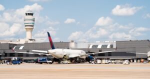 Washington, D.C, United States: The Federal Aviation Administration (FAA) has issued an emergency order mandating a temporary 10 percent reduction in flight operations at 40 of the nation’s busiest airports. The move, announced by U.S. Transportation Secretary Sean P. Duffy and FAA Administrator Bryan Bedford, is aimed at maintaining safety across the national airspace system as the government shutdown enters its second month. FAA Cites Safety Strain, Staffing Pressures Since the shutdown began, thousands of air traffic controllers have worked without pay, triggering severe staffing shortages and operational stress across major hubs. The FAA said it recorded 2,740 delays over the past weekend alone, reflecting growing pressure on the system. “My department has many responsibilities, but our number one job is safety. This isn’t about politics – it’s about assessing the data and alleviating building risk in the system as controllers continue to work without pay,” Secretary Duffy said. “It’s safe to fly today, and it will continue to be safe to fly next week because of the proactive actions we are taking.” Administrator Bedford added, “We are seeing signs of stress in the system, so we are proactively reducing the number of flights to make sure the American people continue to fly safely. The FAA will continue to closely monitor operations and will not hesitate to take further action to make sure air travel remains safe.” Summary of the FAA Emergency Order According to the directive: A 4% reduction in domestic operations takes effect Friday, Nov 7, ramping up to 6% by Nov 11, 8% by Nov 13, and 10% by Nov 14. International flights are exempt, allowing airlines discretion to decide which routes to reduce. Airlines must issue full refunds for canceled flights, though they are not required to cover secondary costs, consistent with federal policy for government-related disruptions. The FAA also temporarily: Prohibits visual flight rule (VFR) approaches at affected facilities with staffing triggers. Limits commercial space launches and reentries to the hours of 10 p.m.–6 a.m. local time. Suspends parachute operations and aerial photography missions near impacted facilities. The agency said the measures were guided by safety data and voluntary reports from pilots and controllers showing mounting fatigue and system stress. Impact on Travelers Officials emphasized that the airspace remains safe but acknowledged the steps are preventive and temporary. Airlines are adjusting schedules to comply with the phased reductions, focusing cancellations during peak domestic hours. The FAA said any expansion or rollback of the cuts will be driven by real-time safety data. Official List of Affected Airports ANC – Ted Stevens Anchorage International Airport ATL – Hartsfield-Jackson Atlanta International Airport BOS – Boston Logan International Airport BWI – Baltimore/Washington International Airport CLT – Charlotte Douglas International Airport CVG – Cincinnati/Northern Kentucky International Airport DAL – Dallas Love Field DCA – Ronald Reagan Washington National Airport DEN – Denver International Airport DFW – Dallas/Fort Worth International Airport DTW – Detroit Metropolitan Wayne County Airport EWR – Newark Liberty International Airport FLL – Fort Lauderdale/Hollywood International Airport HNL – Honolulu International Airport HOU – William P. Hobby Airport IAD – Washington Dulles International Airport IAH – George Bush Houston Intercontinental Airport IND – Indianapolis International Airport JFK – New York John F. Kennedy International Airport LAS – Las Vegas McCarran International Airport LAX – Los Angeles International Airport LGA – New York LaGuardia Airport MCO – Orlando International Airport MDW – Chicago Midway International Airport MEM – Memphis International Airport MIA – Miami International Airport MSP – Minneapolis–St. Paul International Airport OAK – Oakland International Airport ONT – Ontario International Airport ORD – Chicago O’Hare International Airport PDX – Portland International Airport PHL – Philadelphia International Airport PHX – Phoenix Sky Harbor International Airport SAN – San Diego International Airport SDF – Louisville International Airport SEA – Seattle–Tacoma International Airport SFO – San Francisco International Airport SLC – Salt Lake City International Airport TEB – Teterboro Airport TPA – Tampa International Airport Looking Ahead The FAA said it will continue to review safety metrics daily to determine whether further cuts or operational adjustments are needed. “Safety reporting is showing us where the stress points are,” the agency said. “This order will remain in effect only as long as necessary to maintain system stability.” Passengers traveling through the affected airports are urged to monitor airline communications for updated flight schedules and potential waivers.