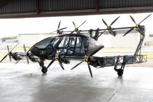 Wellington, New Zealand: The New Zealand Government has introduced a new civil aviation rule aimed at reducing regulatory barriers and accelerating innovation in aerospace and advanced aviation technologies. The reform, described as a “global-first,” establishes regulatory sandboxes that allow companies and research organisations to test and refine aviation technologies with fewer approval requirements. Under the new framework, which comes into effect on 22 December 2025, organisations can make minor iterative changes to test systems without seeking fresh approvals from the Civil Aviation Authority of New Zealand (CAA), provided the changes are not “substantial.” “This rule enables researchers and businesses to rapidly develop products without needing approval for small changes from the Civil Aviation Authority,” said Judith Collins, Minister for Space. “It provides clear pathways for the sector to test, trial, and grow while maintaining strong safety safeguards.” The reforms include amendments to drone regulations under Part 101, Operating Rules and Part 102 – Operator Certification. Some operations that previously required Part 102 certification, such as night flights or beyond-visual-line-of-sight operations in enclosed spaces, have been reclassified under Part 101, reducing regulatory complexity for low-risk activities. High-risk operations, including agricultural spraying and use of toxic agents, remain tightly controlled. A new rule, Part 107 – Research and Development Organisation Certification, formalises the sandbox approach, allowing research organisations to conduct experimental flights and technology trials without repeated regulatory approval. The new rules coincide with a permanent designation of special-use airspace (SUA) around the Tāwhaki National Aerospace Centre near Christchurch. The SUA provides controlled airspace for experimental flights and test operations, activated on a per-need basis via NOTAMs, ensuring safety for other airspace users. Associate Transport Minister James Meager emphasised that the reforms modernise drone regulation, clarifying which low-risk operations can proceed without certification while keeping high-risk activities under strict oversight. The government says the changes signal a shift toward agile, innovation-friendly aviation governance. By reducing red tape, New Zealand positions itself as an attractive hub for aerospace R&D, including drones, autonomous aircraft, and electric vertical-takeoff-and-landing (eVTOL) platforms. The regulatory overhaul builds on previous reforms under the Civil Aviation Act 2023, which updated rules around safety-sensitive personnel, authorisation, and airline transparency. The 2025 amendments are part of a broader Advanced Aviation initiative designed to support emerging aviation technologies while maintaining safety standards. For aerospace developers and investors, the sandbox framework and dedicated test airspace lower barriers for prototyping and experimentation, potentially accelerating time-to-market for innovative aviation solutions.