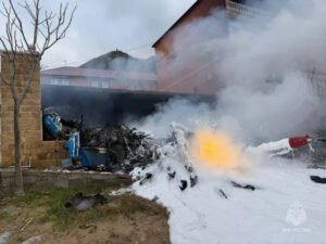 Dagestan, Russia: A Russian Ka-226 light utility helicopter operated by Kizlyar Electromechanical Plant (KEMZ) crashed in the Republic of Dagestan on Friday, after catching fire mid-air, killing at least five people, including senior officials of the defense manufacturer. The helicopter, registered RA-19307, was flying from Kizlyar to Izberbash on November 7 when it reportedly caught fire while airborne near the village of Achi-Su, close to the Caspian Sea. videos circulating on Russian and international media show the aircraft’s tail section detaching as it spun uncontrollably before slamming into the ground and erupting into flames. According to a statement by the plant, the dead included KEMZ’s deputy general director, chief engineer, and chief designer. Two other employees who were initially reported injured also succumbed to their injuries, KEMZ, part of the Rostec defense conglomerate, manufactures the Ka-226 multipurpose helicopter used by Russian armed forces and civilian operators. Video evidence reviewed by multiple outlets shows the pilot struggling to stabilize the aircraft after its tail rotor failed mid-air. Witnesses reported seeing the helicopter hover momentarily before the fuselage ignited and fell to the ground. The aircraft crashed into an unoccupied private house, causing no ground casualties, regional authorities confirmed. Russia’s Federal Air Transport Agency (Rosaviatsia) classified the event as a “disaster” and opened an inquiry into possible violations of flight-safety regulations. The Investigative Committee of Russia has launched a separate criminal probe into potential breaches of airworthiness and maintenance procedures. Preliminary assessments suggest a mechanical or structural failure in the tail section may have triggered the inflight breakup. Experts also noted that ongoing sanctions have limited access to certain aviation components, raising maintenance and reliability concerns across several Russian aircraft fleets. The pilot appeared to have continued flight despite visible structural damage before attempting an emergency landing. Aviation analysts have called the decision “questionable,” given the apparent loss of tail-rotor control, which is critical for helicopter stability. The Kamov Ka-226 is a twin-engine, light utility helicopter designed for reconnaissance, medical evacuation, and transport missions. Known for its coaxial rotor configuration, the type has been in service since the late 1990s and is produced by KEMZ under license. The same model was previously involved in several non-fatal incidents linked to gearbox and rotor-system issues. Authorities have not yet released the flight data or cockpit voice recorders, and the investigation is expected to continue in coordination with Russia’s Interstate Aviation Committee.