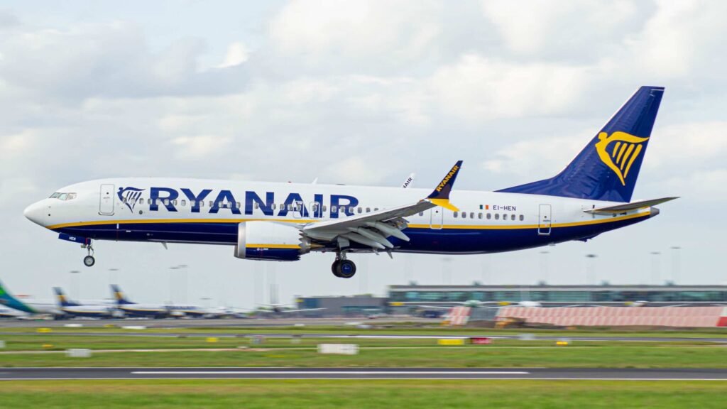 Dublin, Ireland: Ryanair has completed its transition to 100% digital boarding passes, ending the use of printed passes across its network from 12 November 2025. The airline said the move marks a major milestone in its ongoing digital overhaul aimed at streamlining airport processes, cutting costs and reducing paper waste. The shift was originally scheduled for 3 November but was pushed to 12 November to avoid peak mid-term travel. From now on, passengers checking in for any Ryanair flight must use the myRyanair mobile app, which generates the only accepted boarding pass format. Ryanair said the first day of the rollout was “a huge success,” with more than 700 flights departing by mid-day and over 98% of passengers using digital passes without issues. The remaining 2%, mostly travellers unable to load the app, were issued printed passes at airport desks free of charge, provided they had already checked in online. CMO Dara Brady said customer feedback was “universally positive” and the digital system helped speed up security and boarding processes. Ryanair confirmed that printed boarding passes will no longer be accepted at any airport unless local regulations require them. Exemptions remain in specific markets such as Morocco, Tirana (Albania) until March 2026. Passengers who lose phone access after checking in due to battery failure or device issues will receive a printed pass at the airport at no additional charge. The airline says the digital switch will eliminate over 300 tonnes of paper annually, while nearly 80% of its 200 million passengers were already using digital boarding passes. Ryanair also expects the move to help phase out most airport check-in fees. The myRyanair app now centralizes travel documents and offers new features including “Order to Seat” food and beverage delivery, live gate and delay alerts, and real-time disruption updates. The shift has drawn criticism from consumer rights groups and EU lawmakers. Concerns include digital exclusion for passengers without smartphones, potential data privacy implications, and disruptions if app or device malfunctions occur. Technology analysts also noted that the move effectively forces passengers to download the Ryanair app, increasing dependency on the platform.