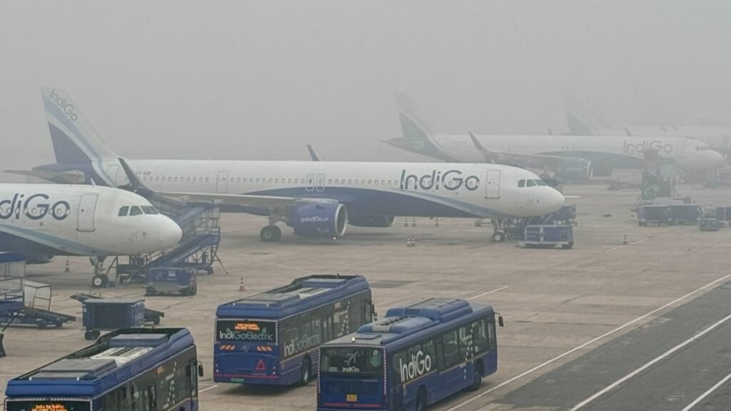 New Delhi, India: India’s aviation watchdog has imposed a ₹20 lakh penalty on IndiGo for violating instrument flight procedure norms at Udaipur’s Maharana Pratap Airport, marking another compliance setback for the country’s largest airline. According to a regulatory filing by InterGlobe Aviation, the parent company of IndiGo, the Directorate General of Civil Aviation (DGCA) found the airline in breach of rules after it implemented a Standard Instrument Departure (SID) and Instrument Flight Procedure (IFP) that had been internally formulated by the company rather than issued by the Airport Authority of India (AAI), the only authorised body to publish such procedures. The DGCA stated that the airline’s actions violated Rule 133A of the Aircraft Rules, 1937, along with provisions of Civil Aviation Requirement (CAR) Section 9, Series C, Part I, specifically paragraphs 2.2 and 2.34, which mandate strict adherence to officially promulgated instrument procedures. InterGlobe confirmed that the communication from the DGCA was received on 17 November 2025. In its exchange filing, the company noted that the penalty would have “no material impact” on its operations or financial position. Industry observers say the latest order reflects DGCA’s tightening oversight on airlines’ compliance with flight procedures, especially at airports that require strict navigational conformity. Instrument departures and arrivals are critical for maintaining flight safety, particularly in regions with terrain challenges or high-density traffic. The penalty comes weeks after DGCA imposed a ₹40 lakh fine on IndiGo for using non-qualified full-flight simulators to train pilots operating to Category C airports, including Leh, Calicut, and Kathmandu. The investigation revealed that nearly 1,700 pilots underwent training on simulators that did not meet regulatory standards prescribed for operations into these high-difficulty airports. In that case, DGCA penalised IndiGo’s Director of Training and Director of Flight Operations with individual fines of ₹20 lakh each, citing oversight lapses and deviations from CAR guidelines.