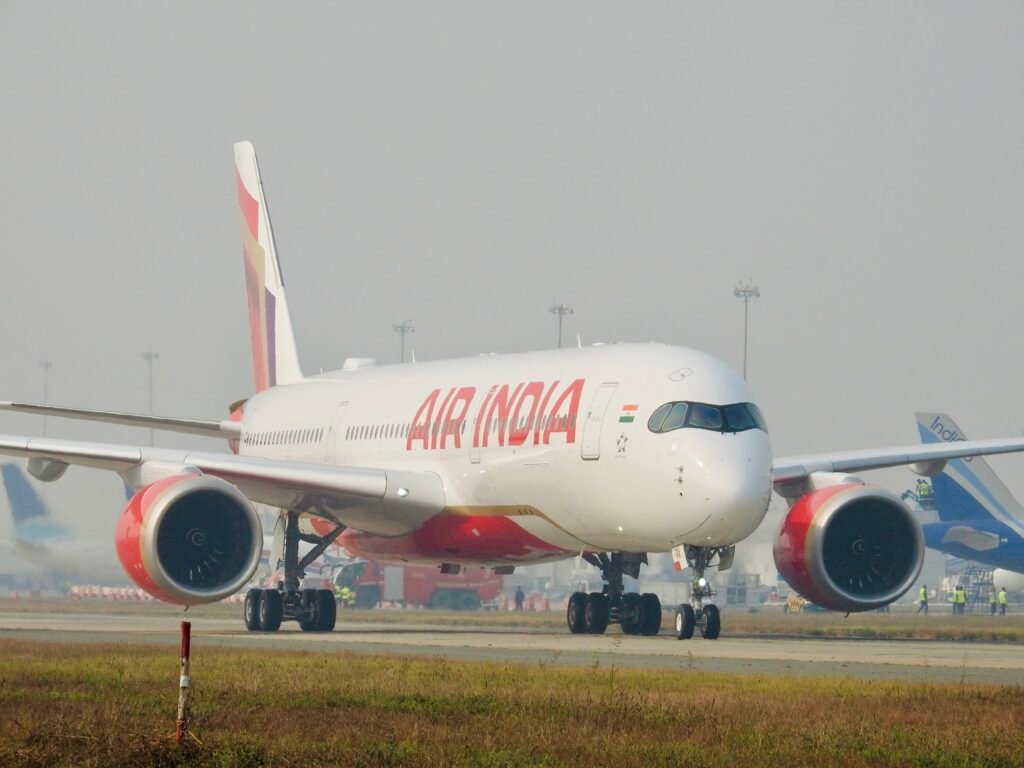 New Delhi, India: More than 800 flights were delayed at Indira Gandhi International Airport (IGIA) after a technical failure disrupted air traffic control systems on Friday, causing widespread operational chaos at one of the world’s busiest airports. The Airports Authority of India (AAI) confirmed that a malfunction occurred in the airport’s Automatic Message Switching System (AMSS) , a critical platform that generates and distributes flight plans to controllers and pilots. The failure forced the ATC to manually process flight plans, drastically slowing departures through Friday. “The system developed a technical issue late Thursday evening, leading to temporary delays in flight departures,” the AAI said in a statement on X (formerly Twitter). “Technical teams are working to restore the system at the earliest.” According to flight-tracking platform Flightradar24, over 800 flights experienced delays, with more than 175 departures affected on Friday morning alone. The average delay was around 55 minutes, but several international routes were held back much longer. Domestic carriers, including IndiGo, SpiceJet and Air India, reported schedule disruptions. IndiGo’s shares dropped 1.5 % in response. An ITA Airways flight to Rome was delayed by nearly two hours, while a Virgin Atlantic service to London took off more than an hour behind schedule. While the AAI has not confirmed the root cause, officials said preliminary checks are underway to determine whether the issue was linked to a possible malware intrusion. A senior aviation ministry source told Reuters that “cybersecurity experts are reviewing the system logs for any signs of tampering or external interference.” Delhi’s IGIA, managed by GMR Airports Limited and overseen by the AAI, handled 78 million passengers in 2024, ranking as the ninth-busiest airport globally according to Airports Council International. AAI technicians and software vendors were still working late Friday to fully restore the AMSS. The Directorate General of Civil Aviation (DGCA) has been briefed and is monitoring the situation for compliance and safety implications. No cancellations were officially reported, but passengers experienced long queues, rescheduling, and confusion as airlines adjusted flight plans.