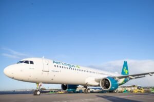 Manchester, United Kingdom: An Aer Lingus long-haul flight from Bridgetown, Barbados, to Manchester Airport was forced to carry out an emergency landing early Monday morning after the crew reported a technical issue during the approach phase of the flight. Flight EI030, which departed Barbados just before 7:30 p.m. GMT on Sunday for an overnight journey to Manchester, touched down safely on Manchester’s runway shortly before 8 a.m. local time. According to statements from both the airline and Manchester Airport officials, the aircraft encountered a technical issue that affected the aircraft’s hydraulic systems as it neared the UK destination. “Aer Lingus flight EI030 from Barbados to Manchester landed safely at Manchester Airport following a technical issue,” an Aer Lingus spokesperson said. “Due to the technical issue, the aircraft was met by emergency services as a precaution and passengers have safely disembarked.” A Manchester Airport spokesperson confirmed that the issue did not compromise passenger safety, adding that the aircraft was met on the runway by fire and rescue services as a standard precautionary measure when an emergency is declared. Passengers on board were instructed to leave the aircraft on the airfield shortly after landing. Buses transported travellers to the terminal building following disembarkation. There were no reports of injuries among the 261 passengers and crew. Officials emphasised that such procedures are precautionary and did not indicate an immediate danger to those on board. The airline has reportedly been considering changes to its Manchester hub strategy, which includes routes to destinations such as Barbados, New York and Orlando. The potential restructuring has drawn attention due to its impact on local operations and workforce, particularly among cabin crew based at Manchester.