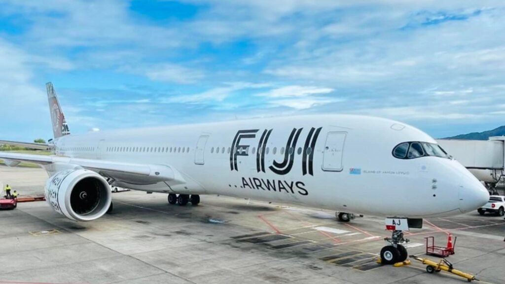 Nadi, Fiji: Fiji Airways has issued a public apology after passengers on an Auckland-bound flight experienced a delay of more than 20 hours, on 20 December, triggering widespread criticism over communication gaps and passenger care during the disruption. The affected flight, scheduled to depart Nadi for Auckland, was delayed due to a combination of operational and safety-related constraints, according to the airline. Fiji Airways confirmed that the aircraft eventually departed after engineers completed the required checks and operational clearances. In a statement, the national carrier said safety considerations remained the overriding factor behind the prolonged delay and stressed that the decision to hold the flight was taken to ensure compliance with aviation safety standards . Passengers, however, described long hours of uncertainty at Nadi International Airport, citing limited information, accommodation challenges, and difficulties accessing timely assistance. Some travellers told local media they were left unclear about departure timelines and support arrangements during the extended wait . Following the incident, Fiji Airways acknowledged shortcomings in its handling of customer communication and said it has begun reviewing its disruption-management procedures. The airline confirmed it is assessing improvements to real-time updates, frontline coordination, and passenger welfare protocols during extended delays . As a goodwill measure, Fiji Airways has offered affected passengers discount vouchers for future travel, while reiterating that safety-driven delays, though rare, can result in unavoidable schedule disruptions . Government officials weighed in as public reaction intensified, with senior leaders acknowledging passenger frustration while backing the airline’s emphasis on safety compliance. Officials noted that operational disruptions must be balanced against strict regulatory and safety obligations in international aviation . The incident has reignited broader discussion in the Pacific aviation sector around airline accountability, crisis communication, and passenger rights during prolonged delays, particularly as regional travel demand continues to rise.
