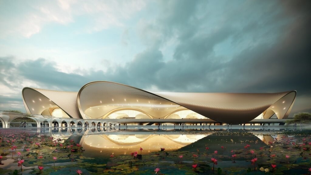 Mumbai, India: Navi Mumbai International Airport (NMIA) has officially commenced commercial flight operations, marking a major milestone in India’s aviation infrastructure expansion and easing long-standing capacity constraints in the Mumbai metropolitan region. On its first full day of scheduled operations, the airport handled 48 domestic flights, collectively serving more than 4,000 passengers, according to officials and airline data. The launch positions Mumbai as India’s first true dual-airport metropolitan region, complementing the existing Chhatrapati Shivaji Maharaj International Airport (CSMIA). The inaugural commercial arrival was an IndiGo flight from Bengaluru, which landed earlier in the day and received a ceremonial water salute. Other carriers operating from NMIA on day one included Air India Express, Akasa Air, and Star Air, offering connectivity to multiple domestic destinations. Initial operations at NMIA are being conducted on a limited daily schedule, with authorities confirming that flight volumes and operating hours will be gradually expanded in the coming weeks. The airport is expected to transition to round-the-clock operations once infrastructure readiness and air traffic coordination are fully optimized. Designed to significantly decongest CSMIA, NMIA will play a central role in accommodating Mumbai’s rapidly growing air travel demand. Once fully developed, the airport is projected to handle tens of millions of passengers annually, with future phases including international passenger services and dedicated cargo operations. Navi Mumbai International Airport is positioning itself as more than a transport hub by embedding culture, hospitality and leisure into the passenger journey from day one. Its non-aeronautical ecosystem introduces India-first concepts such as locally rooted dining brands, personalised meet-and-greet services, an in-terminal transit hotel and immersive cultural zones, reflecting a shift toward experience-led airport design. By integrating rest, retail, art and public spaces into its phased rollout, NMIA aims to redefine how airports engage with both travellers and the city, treating the airport as an extension of urban life rather than a standalone transit facility Aviation and government officials have described the launch as a transformational step for the region’s mobility ecosystem. By redistributing domestic traffic between two airports, authorities expect improved operational efficiency, reduced congestion, and better on-time performance for airlines operating in and out of Mumbai. The airport is also expected to act as a catalyst for economic development in Navi Mumbai, supporting employment generation, real estate growth, and logistics expansion.