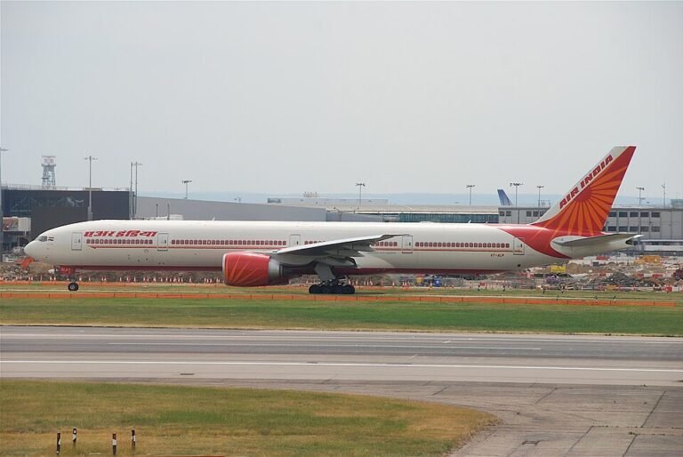 New Delhi, India: An Air India Boeing 777 operating a domestic flight from Delhi to Mumbai made a precautionary return to Indira Gandhi International Airport shortly after take-off on Monday afternoon after pilots detected an abnormal drop in engine oil pressure, according to airline and official sources. The wide-body aircraft, carrying 335 passengers, was airborne when cockpit indications showed low oil pressure in one of the engines. Following standard operating procedures, the flight crew decided to discontinue the journey and return to Delhi as a safety precaution. Air India confirmed that the aircraft landed safely without incident and that all passengers disembarked normally. There were no injuries reported. Preliminary information indicates that the issue was linked to the aircraft’s right engine. Engineering teams were immediately deployed to inspect the aircraft upon landing, and the plane was taken out of service for technical checks. Passengers were accommodated on alternate flights, while some were offered refunds or rescheduling options, airline officials said. Aviation regulator Directorate General of Civil Aviation (DGCA) has been informed of the incident and is reviewing the technical report submitted by the airline, as per established procedures. Officials emphasized that such turn-backs are precautionary measures designed to ensure flight safety and are not uncommon in commercial aviation.