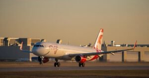 Toronto, Canada: An Air Canada Rouge domestic flight was forced to return to the gate at Toronto Pearson International Airport on December 13, 2025, after a ground crew member became inadvertently trapped in the aircraft’s cargo hold, prompting passengers to alert cabin crew after hearing distressing noises. Flight AC1502, an Airbus A321 bound for Moncton, New Brunswick, had begun taxiing for departure when passengers seated toward the rear reported hearing screaming and banging sounds emanating from beneath the cabin. Several travellers notified flight attendants, who investigated and subsequently halted the aircraft’s progress. In a video shared on social media and verified by local media, the aircraft captain addressed passengers after the taxi was stopped. “I’ve never had that in my life. First time, hopefully first and last,” the pilot said, noting that the trapped individual was safely removed. According to Air Canada, the cargo doors were inadvertently closed while the ground crew member was still inside the hold, and he was discovered only after the plane had already begun to taxi. Emergency procedures were activated, and the aircraft immediately returned to the departure gate. The airline confirmed no injuries were reported and that the employee was freed from the cargo compartment without harm. In a statement to the media, Air Canada said it has “reinforced our procedures with our ground crews” to reduce the likelihood of similar incidents in the future. Passengers described the incident as unsettling. One traveller told CBC that the sounds from the hold were unmistakable and that flight attendants initially checked other areas of the aircraft before determining the source. The flight ultimately did not depart for Moncton as scheduled. Passengers were informed that the delay was beyond the control of the airline and that arrangements would be made for later travel.