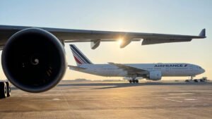 Ashgabat, Turkmenistan: An Air France long-haul service from Bengaluru to Paris was forced to divert to Ashgabat, Turkmenistan, early on January 13, 2026, after one of the aircraft’s engines reported a technical fault mid-flight, leaving passengers stranded for more than 15 hours before onward travel arrangements could be made. Flight AF191A, operated with a Boeing 777-200ER, departed Kempegowda International Airport (BLR) at 11:22 pm IST on January 12 bound for Paris Charles de Gaulle Airport (CDG). Approximately four hours into the scheduled 10-hour journey, the flight crew detected an issue with one of the aircraft’s two engines while over Turkmenistan airspace. Following standard safety protocols and manufacturer guidance, the pilots shut down the affected engine and diverted to the nearest suitable airport. The aircraft made a safe landing at Ashgabat International Airport at 3:37 am local time on January 13. In a statement issued through the Press Trust of India (PTI), Air France confirmed the diversion was purely a precautionary safety measure in response to a “technical incident” involving one of the engines. The airline emphasized that the decision was consistent with company operating procedures and the manufacturer’s instructions. Upon landing, passengers and crew were initially required to remain onboard due to Turkmenistan’s strict visa and entry requirements. Once local authorities cleared entry formalities, travellers disembarked and were assisted by airport staff. Air France arranged hotel accommodation near Ashgabat airport for affected passengers. According to aviation tracking data, a replacement Air France flight, AF386V, was dispatched from Paris Charles de Gaulle to Ashgabat to transport passengers onward. The airline projected that this flight would depart Ashgabat later on January 13, with an estimated arrival at Paris around 2:40 am local time on January 14. However, timings were subject to change based on operational conditions. The Indian Embassy in Turkmenistan confirmed it had met with Indian passengers affected by the diversion and assured them of “full support” to facilitate their onward journey, including assistance with consular formalities. Reports indicate that passengers remained at or around the Ashgabat airport for over 33 hours before relief arrangements were fully in place. Turkmenistan’s stringent entry rules including requirements for invitation letters and mandatory COVID-19 testing for air travellers added to the complexity of managing passenger disembarkation and accommodation in the Central Asian state. No injuries were reported during the diversion or subsequent ground handling. Aviation experts note that unscheduled diversions due to technical issues, while uncommon, are managed through established protocols designed to maintain aircraft and passenger safety. Air France reiterated its regret for the inconvenience experienced by passengers and highlighted that safety remains its top priority.