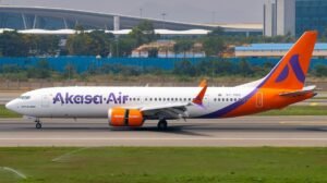 Pune, India: A morning flight operated by Akasa Air from Pune to Bengaluru was significantly delayed on Tuesday after a last-minute technical issue was detected in the aircraft, leading the airline to deplane all passengers and reschedule the service. The Bengaluru-bound flight QP1312, scheduled to depart Pune at 8:50 am, had completed boarding by around 8:10 am when crew members identified a fault in the Boeing 737 MAX aircraft just before departure. Passengers remained seated on board for nearly 90 minutes before airline staff asked them to disembark as a precaution and to carry out further technical checks. In a communication to passengers, Akasa Air stated that the flight had been delayed due to operational reasons and provided a revised departure time of 1:15 pm. The airline also confirmed that the aircraft was undergoing inspection before it could be cleared for take-off. An Akasa Air spokesperson said that affected passengers were offered options to reschedule on an alternative evening flight, and that the refund process had been initiated for those who chose not to travel. Ground staff and Akasa Care teams remained available at Pune Airport to assist travellers. One passenger, who spoke to news agency PTI, confirmed that the flight was held up on the tarmac after a technical issue was reported and that all on board were asked to leave the aircraft once the problem was identified. No further details about the specific nature of the technical issue were provided publicly by the airline at the time of reporting. Akasa Air reiterated its commitment to passenger safety and said it regretted the inconvenience caused by the unforeseen delay.