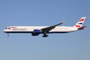 Las Vegas, United States: A British Airways Airbus A350-1000 lost a rear landing gear wheel shortly after departing Harry Reid International Airport in Las Vegas while en route to London Heathrow Airport, officials and aviation trackers confirmed. The incident occurred on Monday evening, 26 January, when Flight BA274, operated by a British Airways Airbus A350-1000 registered G-XWBN, was climbing out after takeoff around 9:05 p.m. local time. Livestream footage from an automated airport camera showed sparks near the right main landing gear as the aircraft lifted off, followed seconds later by the separation of the right-rear wheel assembly as the gear was retracting. Despite the unusual mechanical failure, the flight continued across the Atlantic Ocean and landed safely at Heathrow Airport at about 14:28 GMT on Tuesday, approximately nine hours after departure. Airport officials at Harry Reid International confirmed the wheel was recovered from the airfield, and that no injuries or damage to airport property were reported as a result of the incident. The National Transportation Safety Board (NTSB) has been notified. British Airways said in a statement that “safety and security underpins everything we do” and that the airline is supporting authorities with their investigations into the cause of the separation. The Airbus A350-1000 is equipped with a robust multi-wheel landing gear system, with six wheels on each main landing gear bogie. The detached wheel was the outermost rear wheel on the right main gear. Such redundancy typically allows an aircraft to operate safely even with a single wheel loss, provided all other systems remain within normal operating parameters. Cabin crew conducted an onboard engineering assessment once the aircraft reached cruising altitude and determined there was no immediate safety risk necessitating a diversion to an alternate airport. The decision to complete the transatlantic flight to London was made in consultation with British Airways’ operations and engineering teams. Upon arrival at Heathrow, the aircraft was taken out of service for inspection and repairs. Investigators are expected to examine the landing gear assembly and maintenance history to determine the cause of the wheel separation.