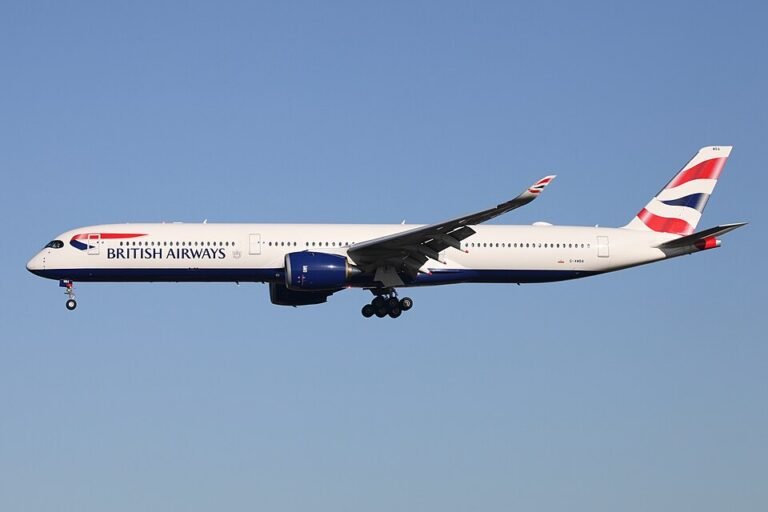Las Vegas, United States: A British Airways Airbus A350-1000 lost a rear landing gear wheel shortly after departing Harry Reid International Airport in Las Vegas while en route to London Heathrow Airport, officials and aviation trackers confirmed. The incident occurred on Monday evening, 26 January, when Flight BA274, operated by a British Airways Airbus A350-1000 registered G-XWBN, was climbing out after takeoff around 9:05 p.m. local time. Livestream footage from an automated airport camera showed sparks near the right main landing gear as the aircraft lifted off, followed seconds later by the separation of the right-rear wheel assembly as the gear was retracting. Despite the unusual mechanical failure, the flight continued across the Atlantic Ocean and landed safely at Heathrow Airport at about 14:28 GMT on Tuesday, approximately nine hours after departure. Airport officials at Harry Reid International confirmed the wheel was recovered from the airfield, and that no injuries or damage to airport property were reported as a result of the incident. The National Transportation Safety Board (NTSB) has been notified. British Airways said in a statement that “safety and security underpins everything we do” and that the airline is supporting authorities with their investigations into the cause of the separation. The Airbus A350-1000 is equipped with a robust multi-wheel landing gear system, with six wheels on each main landing gear bogie. The detached wheel was the outermost rear wheel on the right main gear. Such redundancy typically allows an aircraft to operate safely even with a single wheel loss, provided all other systems remain within normal operating parameters. Cabin crew conducted an onboard engineering assessment once the aircraft reached cruising altitude and determined there was no immediate safety risk necessitating a diversion to an alternate airport. The decision to complete the transatlantic flight to London was made in consultation with British Airways’ operations and engineering teams. Upon arrival at Heathrow, the aircraft was taken out of service for inspection and repairs. Investigators are expected to examine the landing gear assembly and maintenance history to determine the cause of the wheel separation.