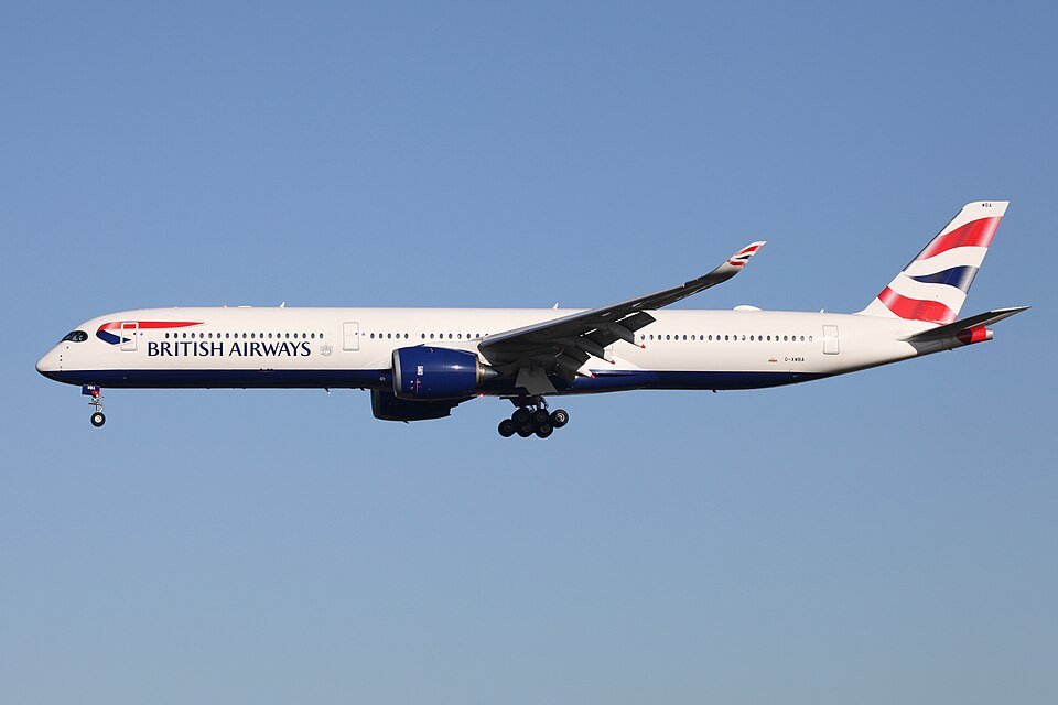 Las Vegas, United States: A British Airways Airbus A350-1000 lost a rear landing gear wheel shortly after departing Harry Reid International Airport in Las Vegas while en route to London Heathrow Airport, officials and aviation trackers confirmed. The incident occurred on Monday evening, 26 January, when Flight BA274, operated by a British Airways Airbus A350-1000 registered G-XWBN, was climbing out after takeoff around 9:05 p.m. local time. Livestream footage from an automated airport camera showed sparks near the right main landing gear as the aircraft lifted off, followed seconds later by the separation of the right-rear wheel assembly as the gear was retracting. Despite the unusual mechanical failure, the flight continued across the Atlantic Ocean and landed safely at Heathrow Airport at about 14:28 GMT on Tuesday, approximately nine hours after departure. Airport officials at Harry Reid International confirmed the wheel was recovered from the airfield, and that no injuries or damage to airport property were reported as a result of the incident. The National Transportation Safety Board (NTSB) has been notified. British Airways said in a statement that “safety and security underpins everything we do” and that the airline is supporting authorities with their investigations into the cause of the separation. The Airbus A350-1000 is equipped with a robust multi-wheel landing gear system, with six wheels on each main landing gear bogie. The detached wheel was the outermost rear wheel on the right main gear. Such redundancy typically allows an aircraft to operate safely even with a single wheel loss, provided all other systems remain within normal operating parameters. Cabin crew conducted an onboard engineering assessment once the aircraft reached cruising altitude and determined there was no immediate safety risk necessitating a diversion to an alternate airport. The decision to complete the transatlantic flight to London was made in consultation with British Airways’ operations and engineering teams. Upon arrival at Heathrow, the aircraft was taken out of service for inspection and repairs. Investigators are expected to examine the landing gear assembly and maintenance history to determine the cause of the wheel separation.