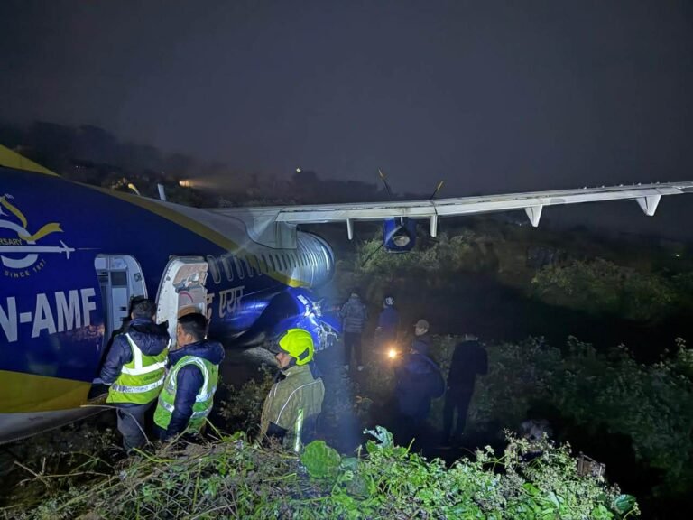Kathmandu, Nepal: A Buddha Air passenger aircraft skidded off the runway while landing at Bhadrapur Airport on Friday night, in an incident that raised safety concerns but ended with all onboard safe and uninjured, officials and airline sources said. The turboprop aircraft, an ATR 72-500 registered as 9N-AMF, operating as Flight U4-901 from Kathmandu to Bhadrapur, overshot the end of the runway late Friday evening and came to rest on grassy ground beyond the runway surface. According to flight and official data, the aircraft landed at approximately 21:06 local time (about 9:06 pm) and overran the runway by an estimated 165–200 metres before stopping near a creek beyond the runway’s end. All 51 passengers and four crew members aboard the flight were evacuated safely with no reported injuries, Nepal Police and airport authorities confirmed. Jhapa district officials said emergency protocols were activated immediately, and passengers were brought out of the aircraft without harm. Buddha Air issued a statement confirming that the aircraft veered off the runway during landing and dispatched a technical and relief team from Kathmandu to assess the plane and manage operational follow-up. The flight was the last scheduled service on the Kathmandu–Bhadrapur sector for the night and was expected to lay over at Bhadrapur Airport before returning to Kathmandu the next morning. Preliminary reports indicate the aircraft sustained damage during the excursion, although the full extent remains under technical evaluation. Authorities have not yet released a definitive cause for the incident, and investigations will likely examine landing procedures, runway conditions, and aircraft performance as part of the routine safety review.